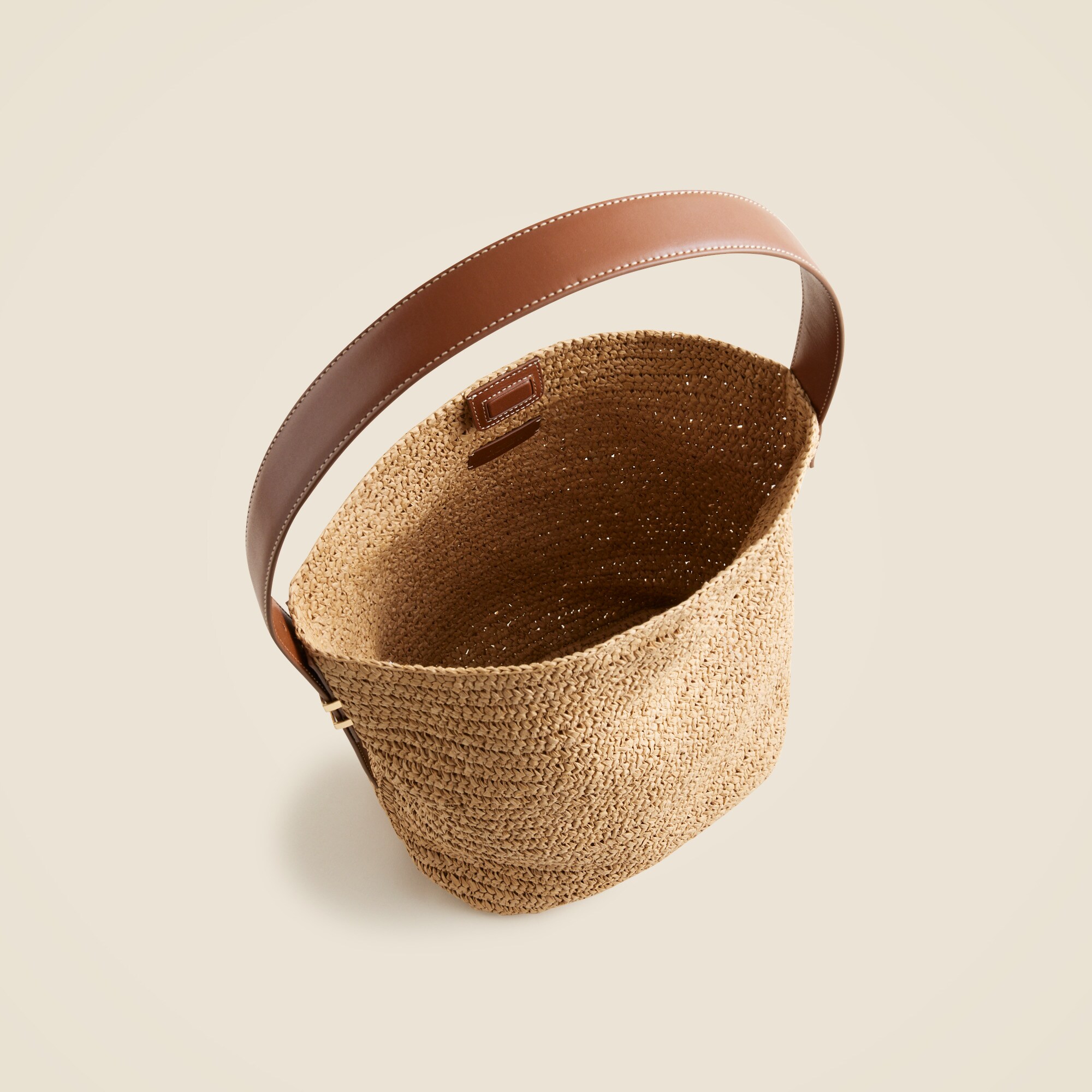 Palma bucket bag in handknotted straw and leather