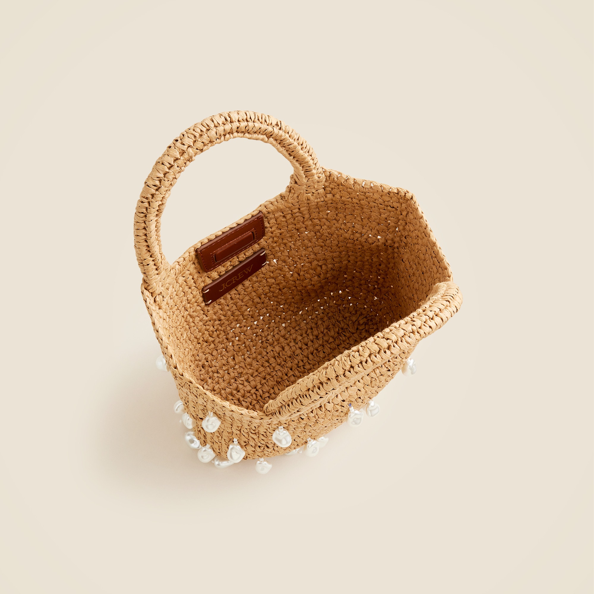 Handknotted top-handle straw bag with baroque pearls