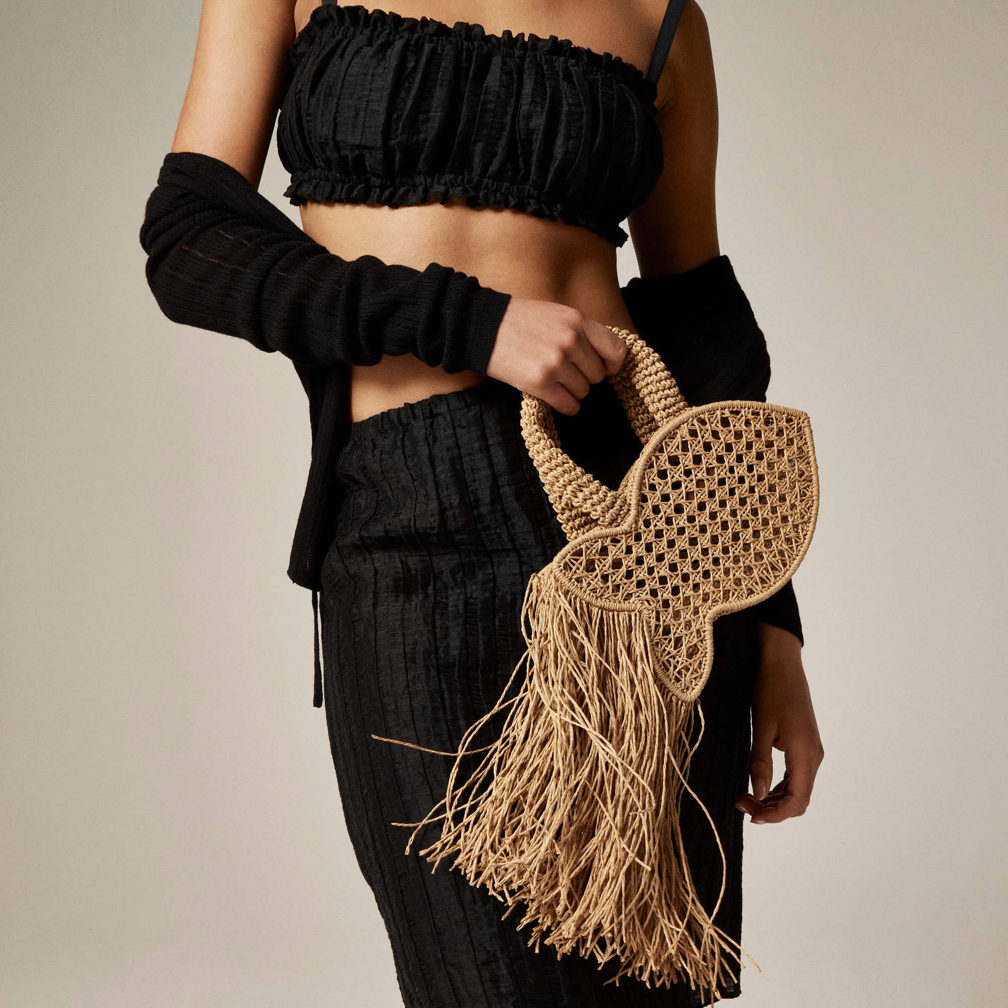 womens Handknotted raffia fish bag with straw fringe