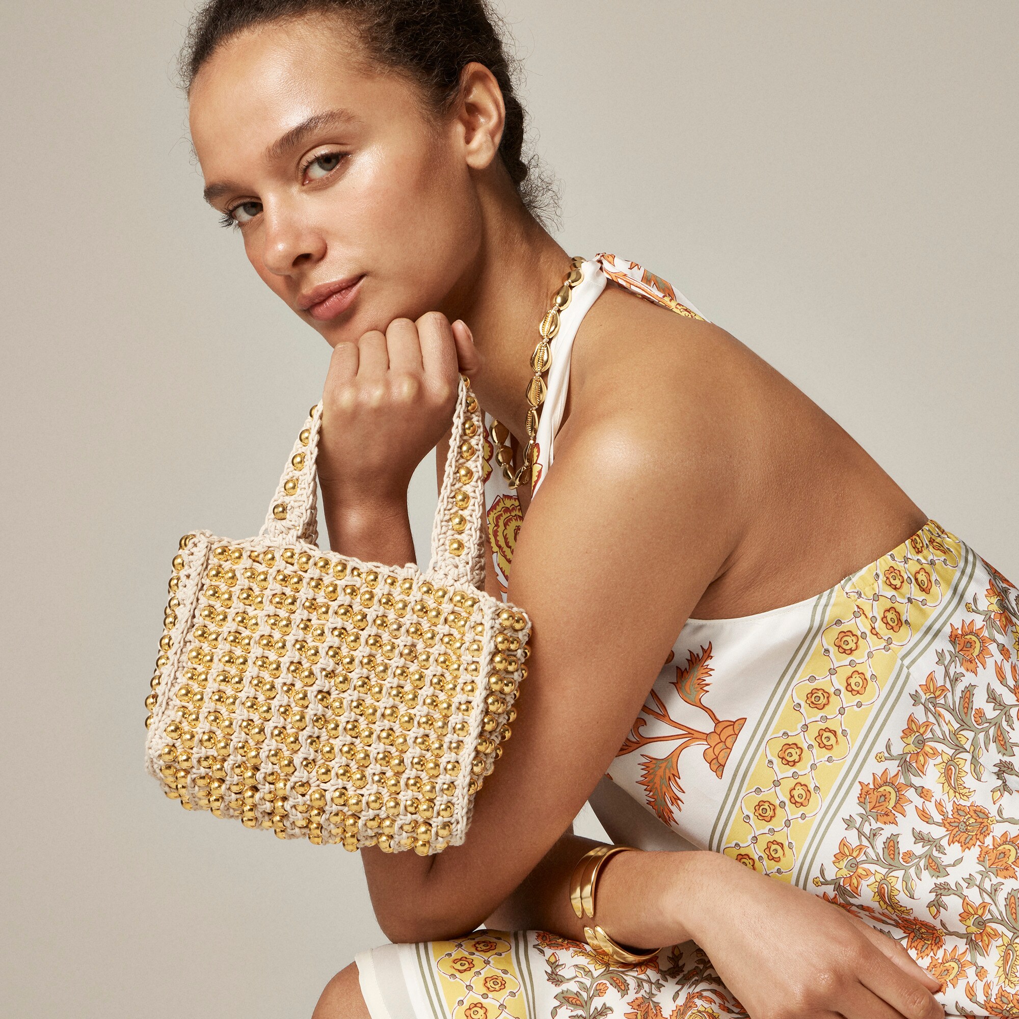 Small handknotted crochet bag with beads