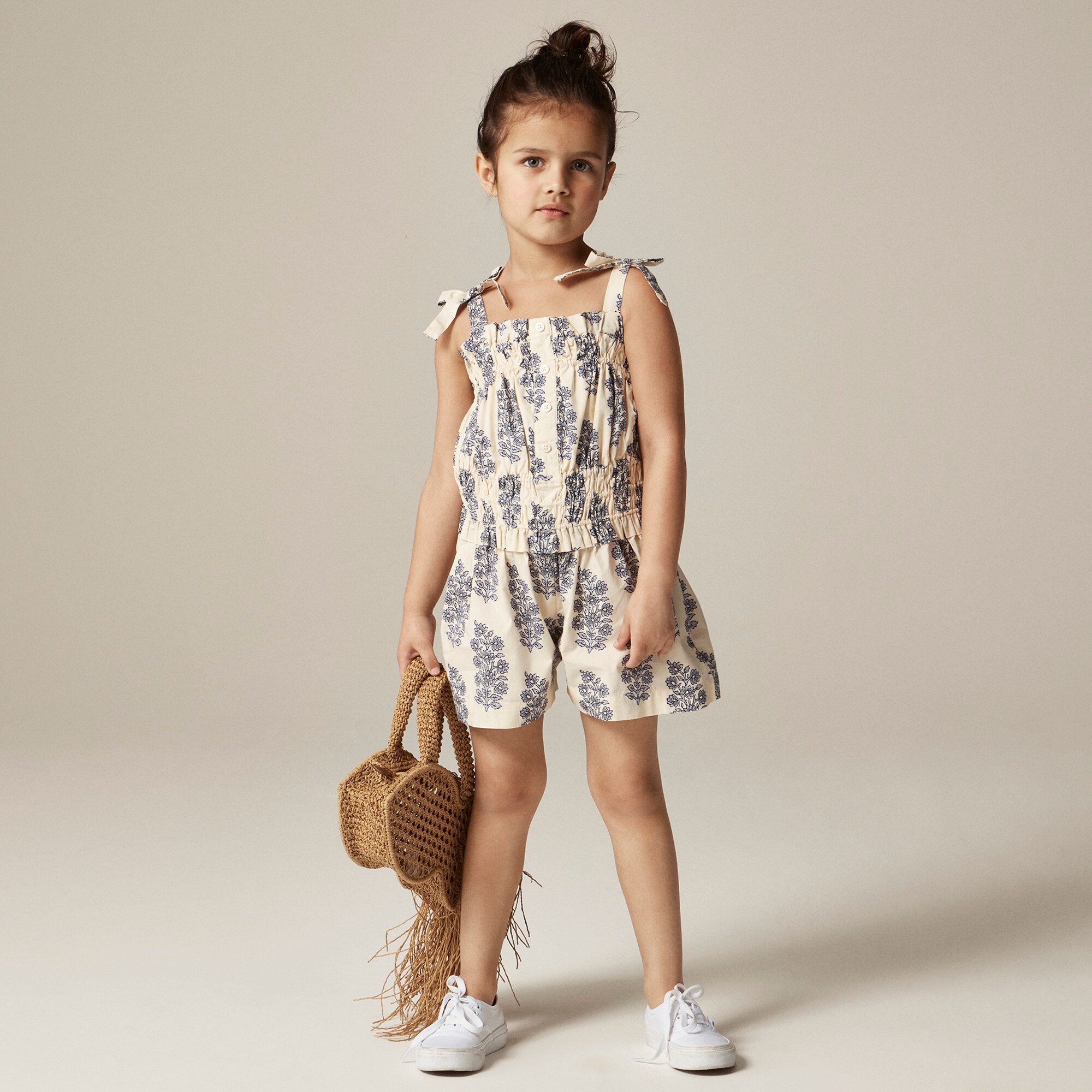 Girls' smocked romper in blooming lilac block print