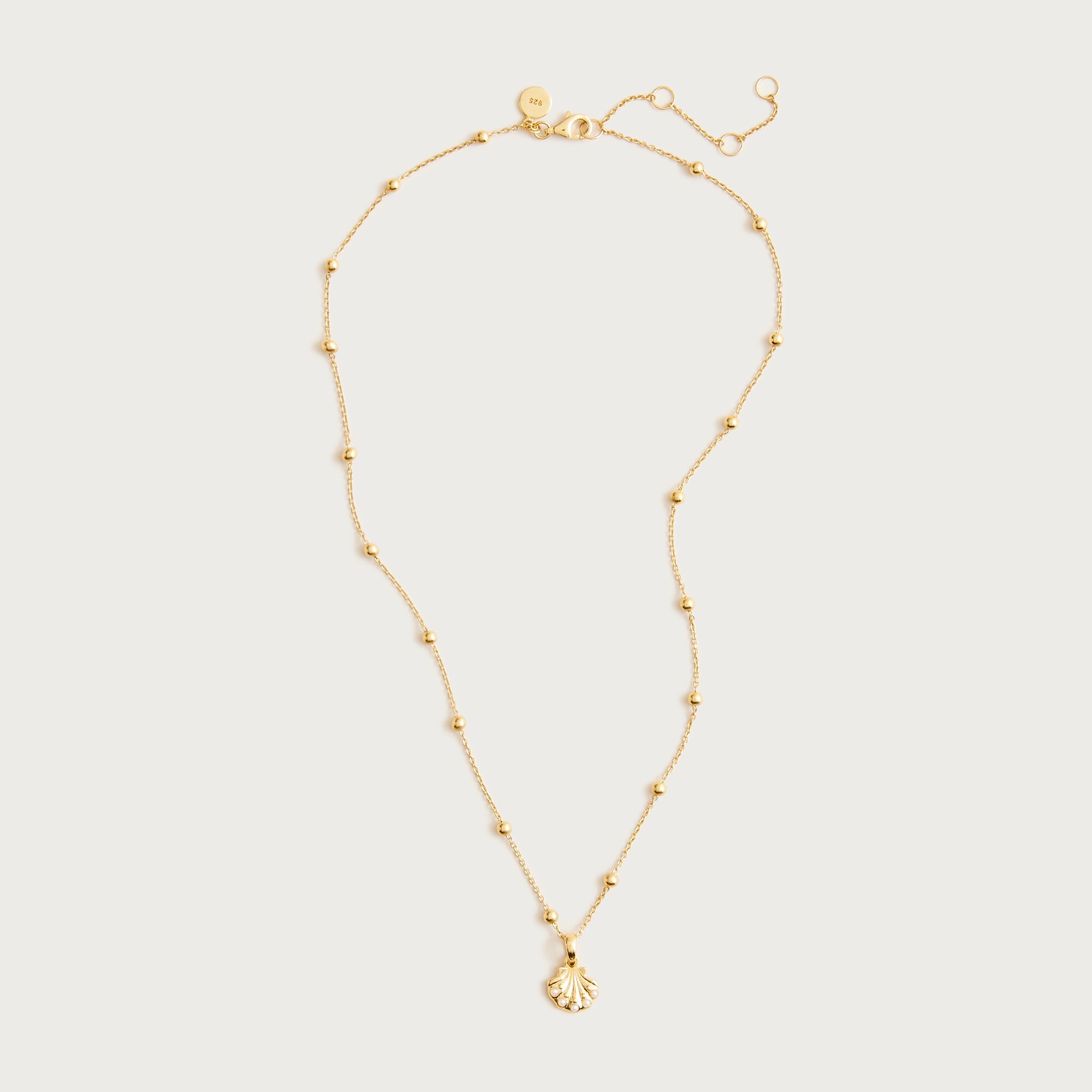 Gold vermeil seashell charm necklace