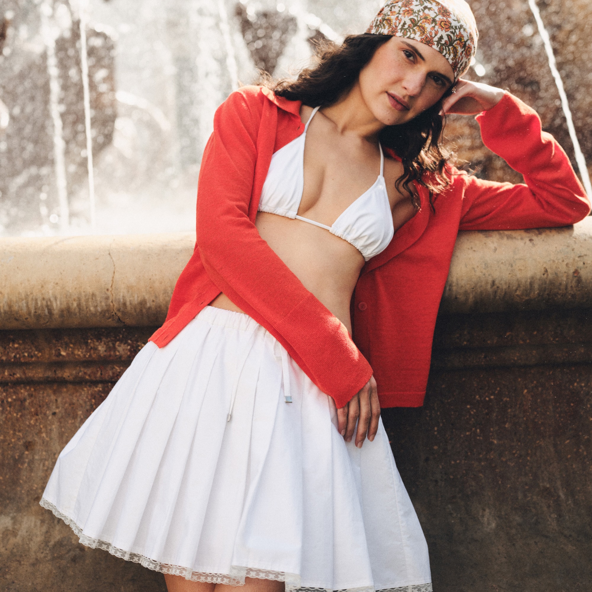 Pleated tie-waist mini skirt