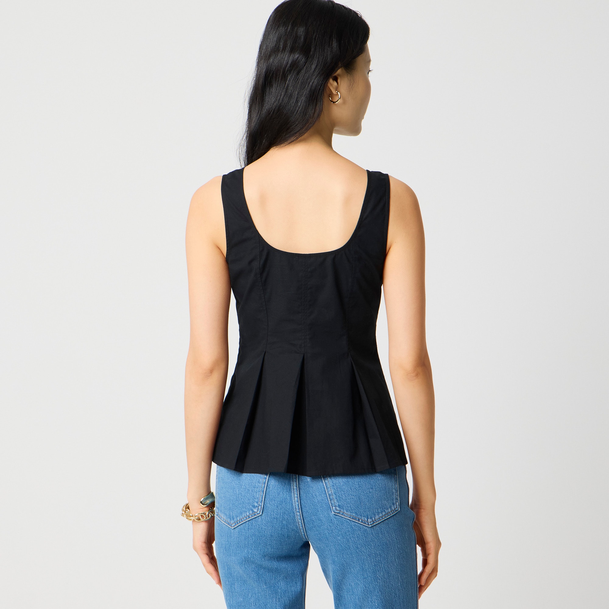 Sleeveless button-up peplum top