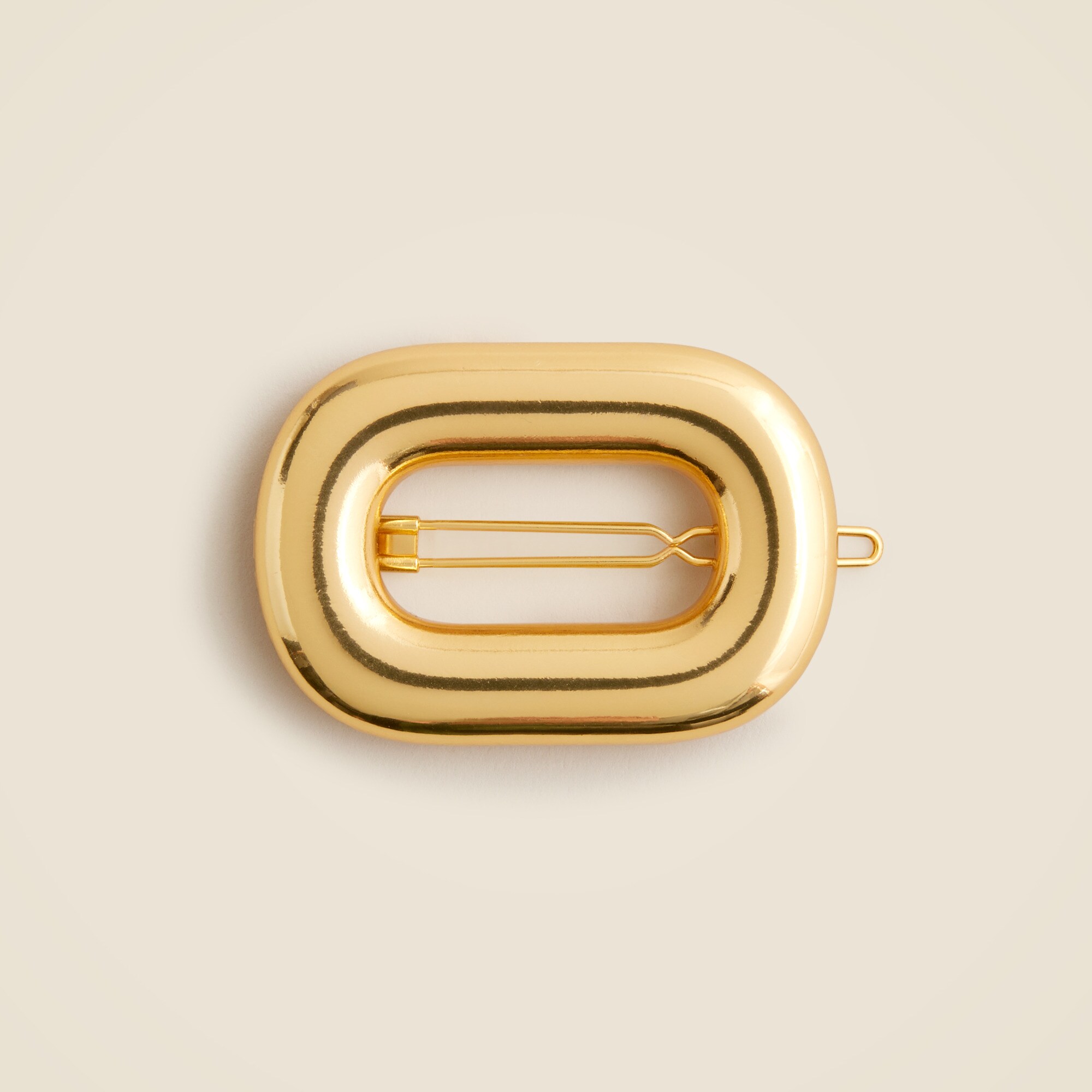 Dimensional oval metallic hair clip