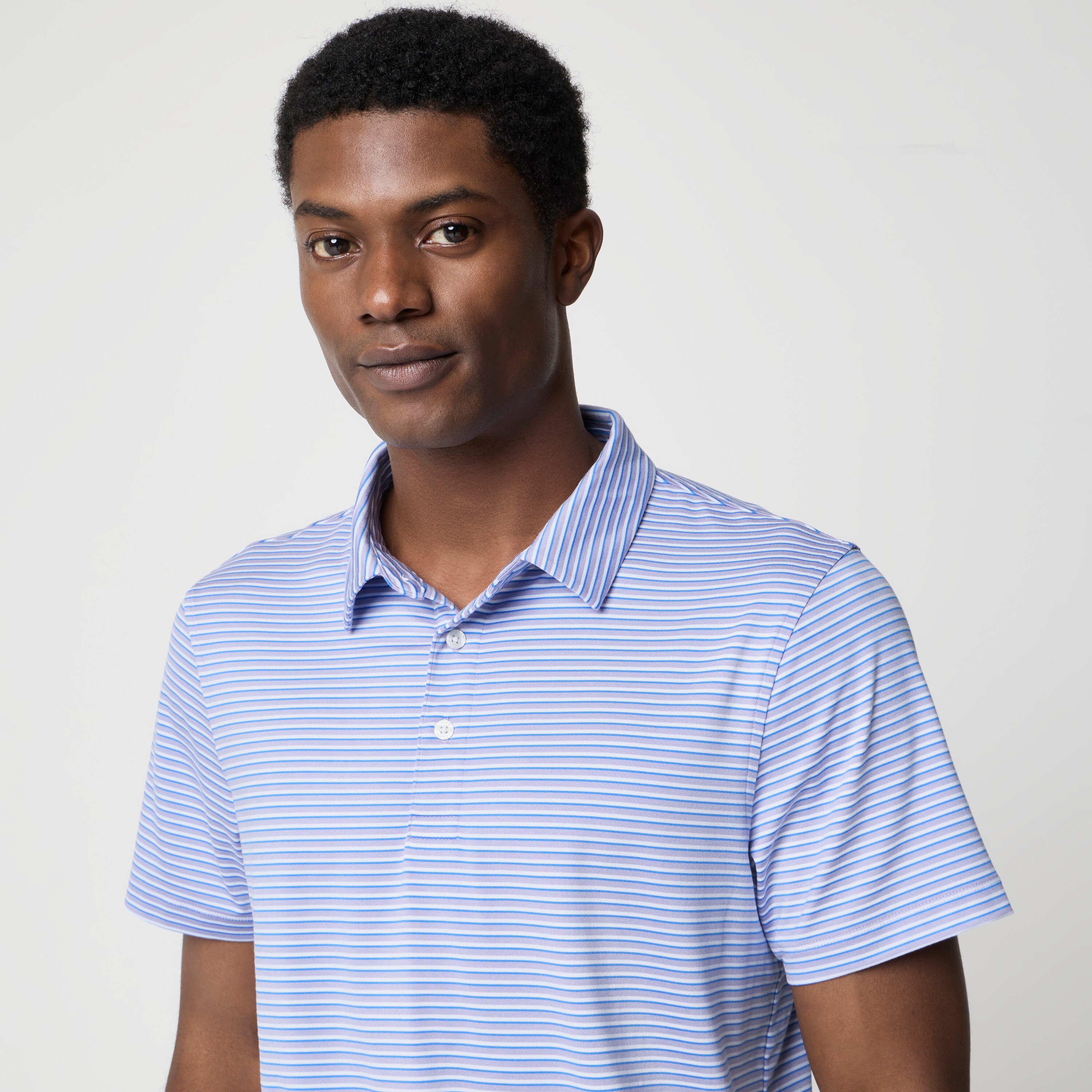 Striped performance polo shirt
