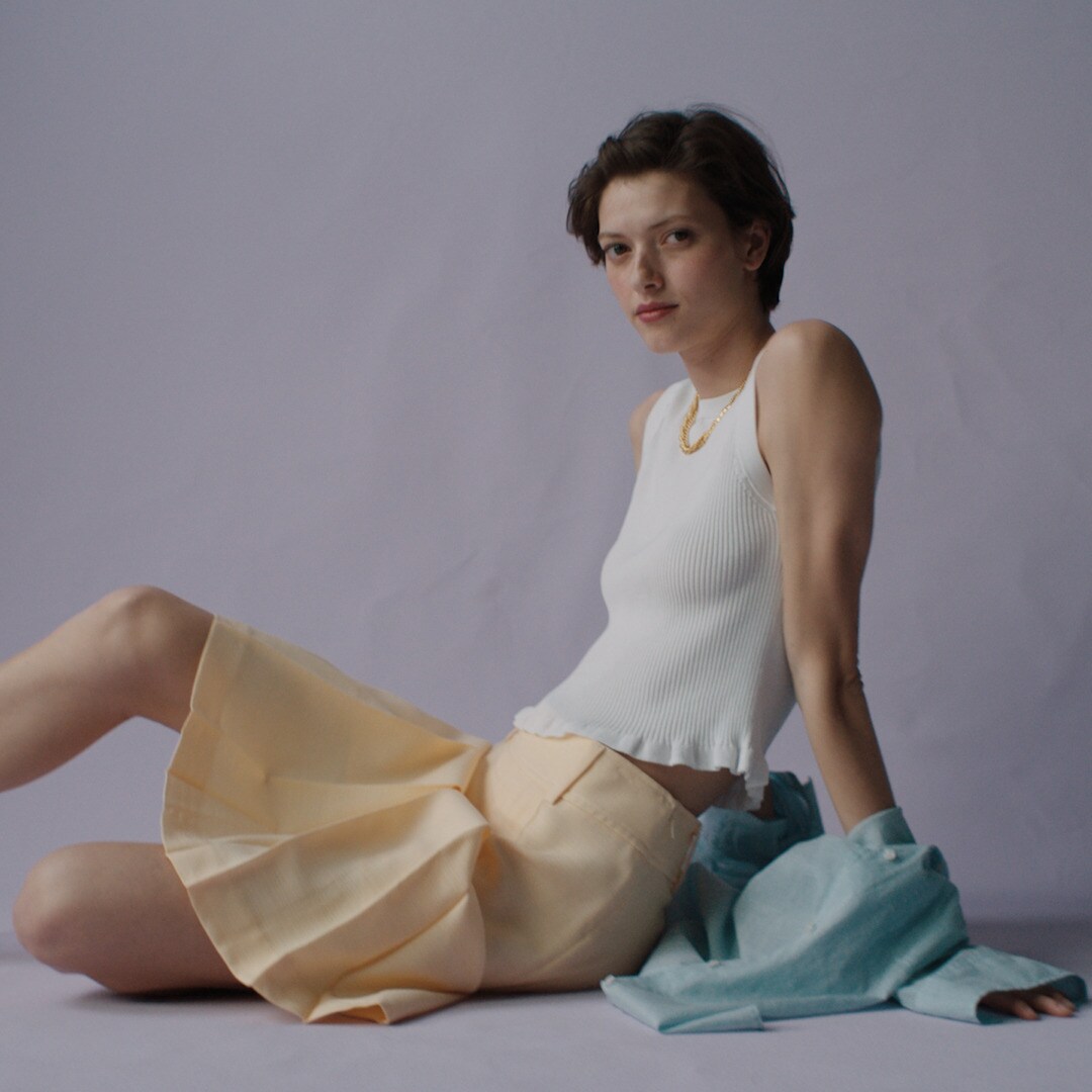 Pleated knee-length skirt in luster canvas
