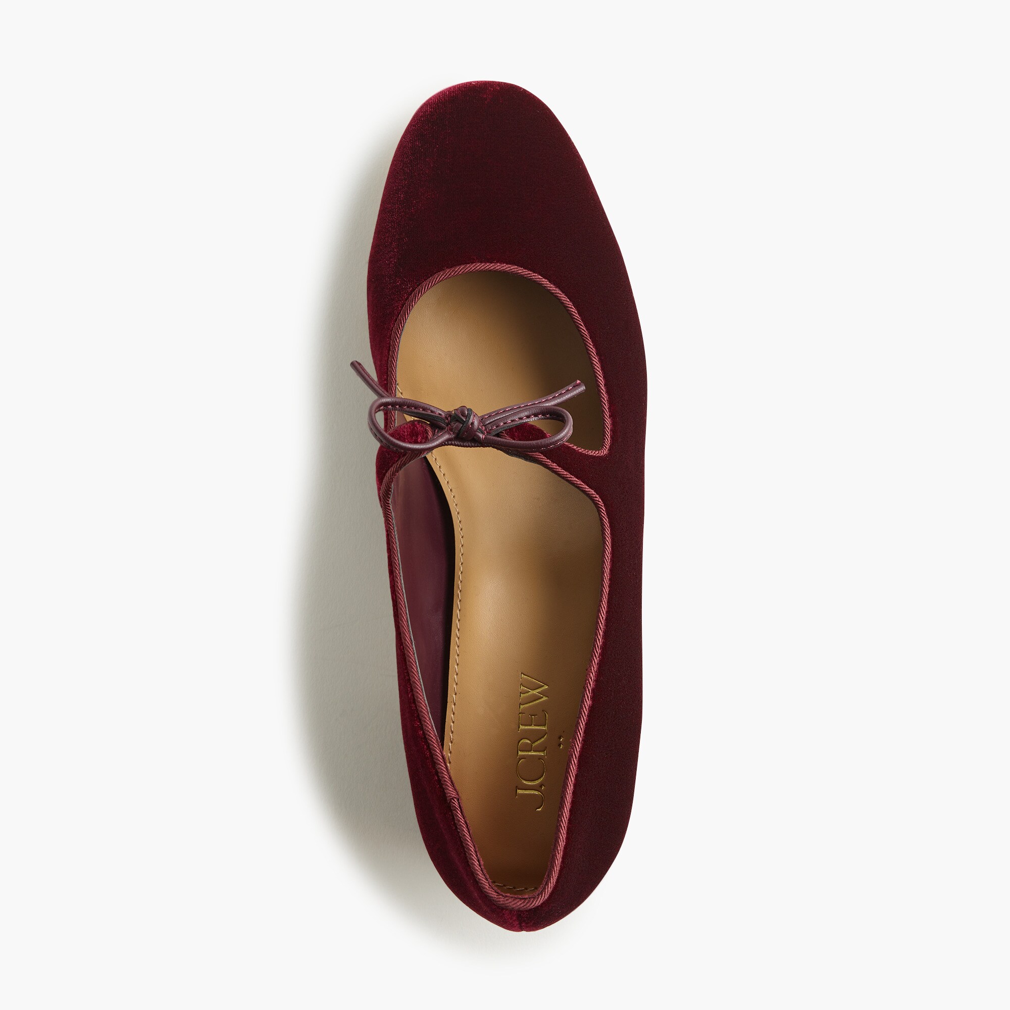 Velvet bow tie–heeled Mary Janes