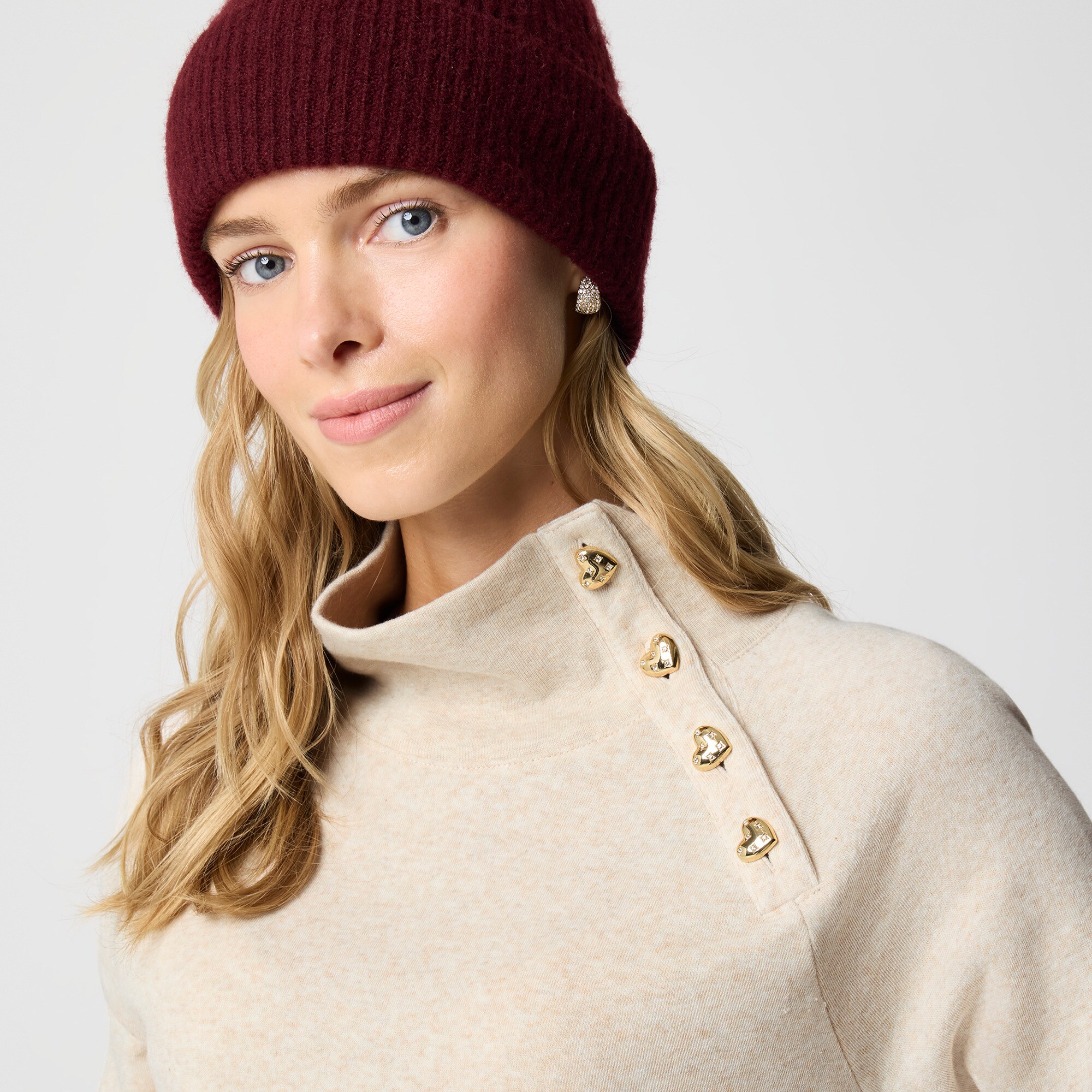 Heart-button mockneck pullover
