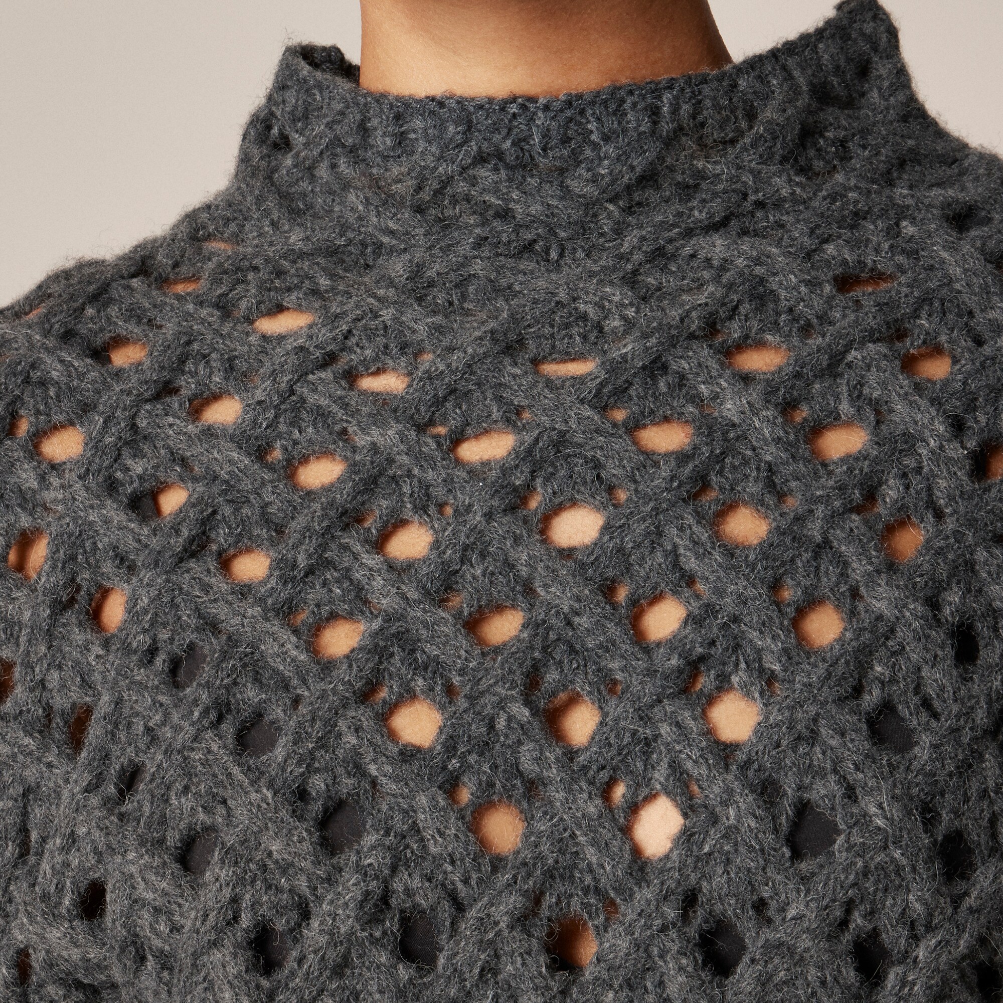 Cross-cable mockneck sweater in wool blend