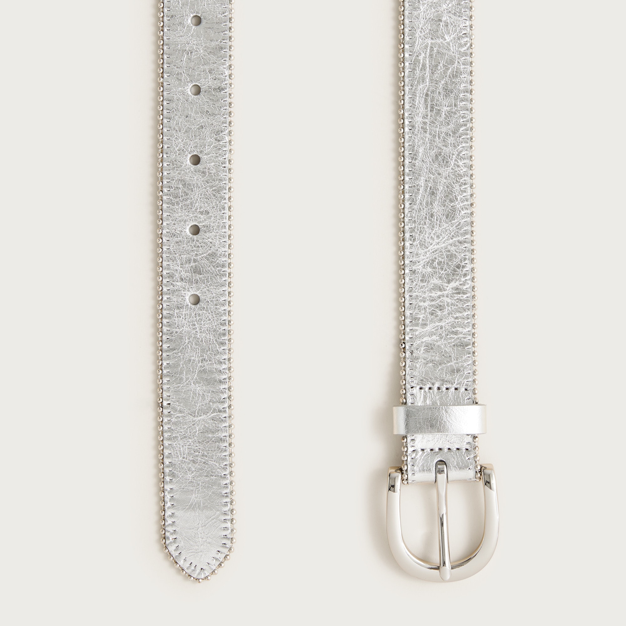 Classic studded-edge belt in metallic leather