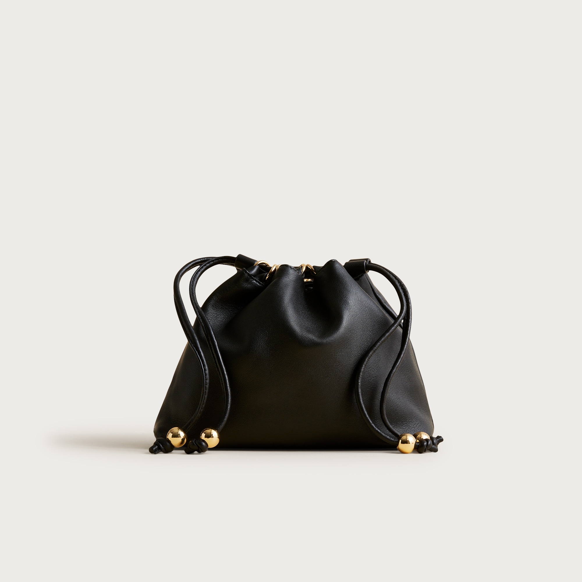 Drawstring pouch bag in leather