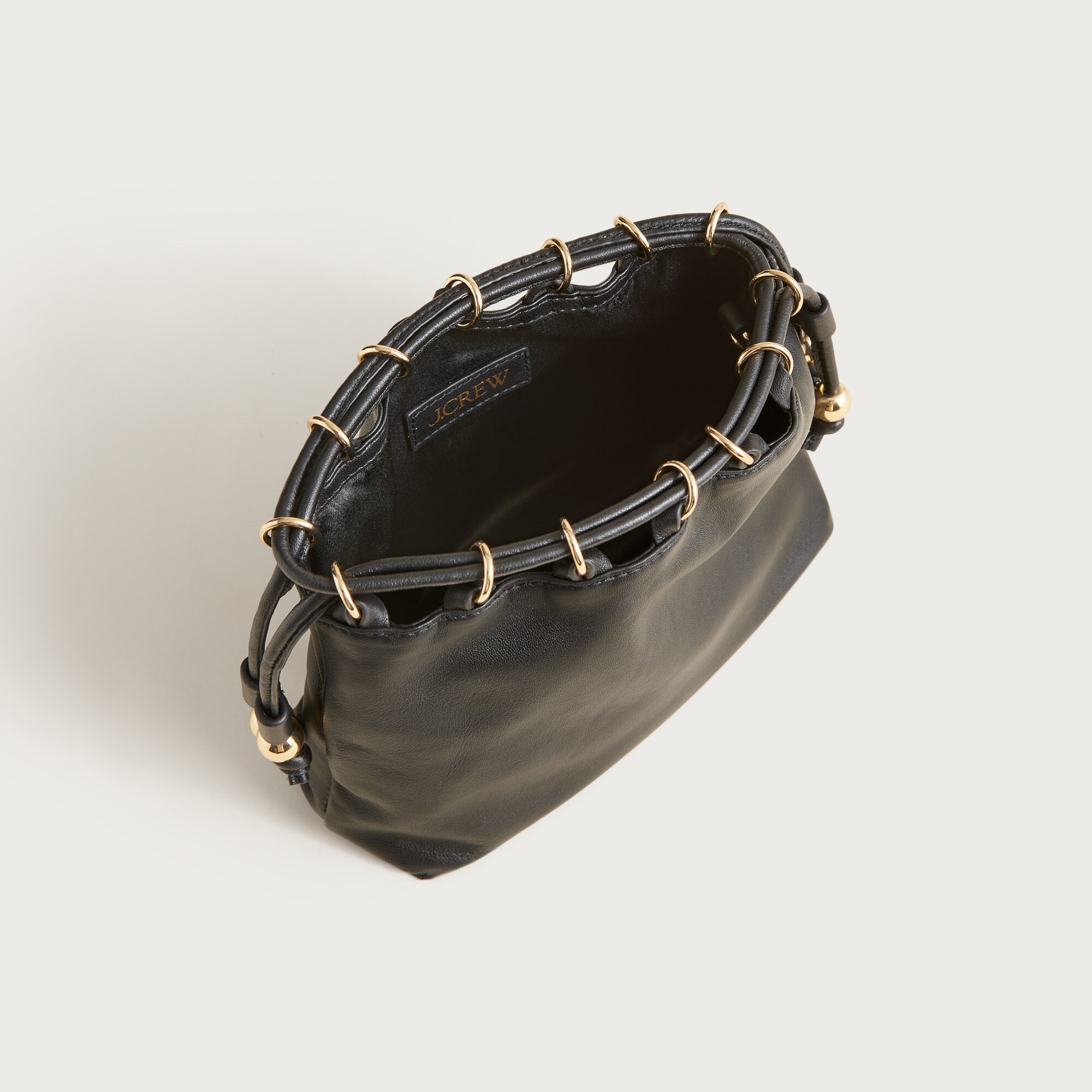 Drawstring pouch bag in leather
