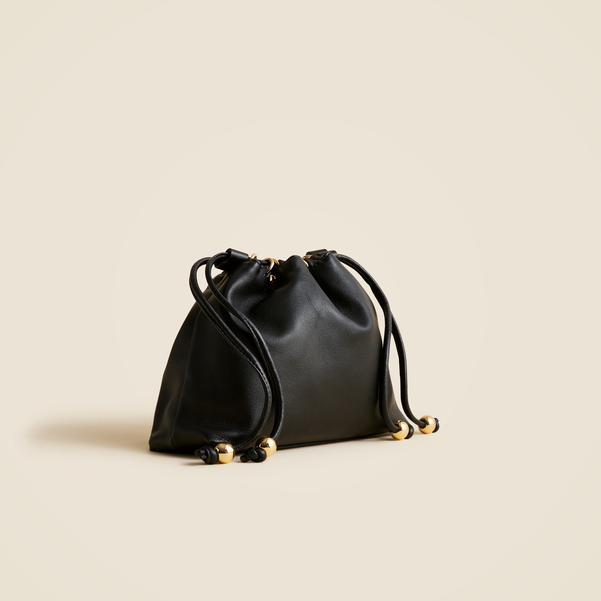 Drawstring pouch bag in leather