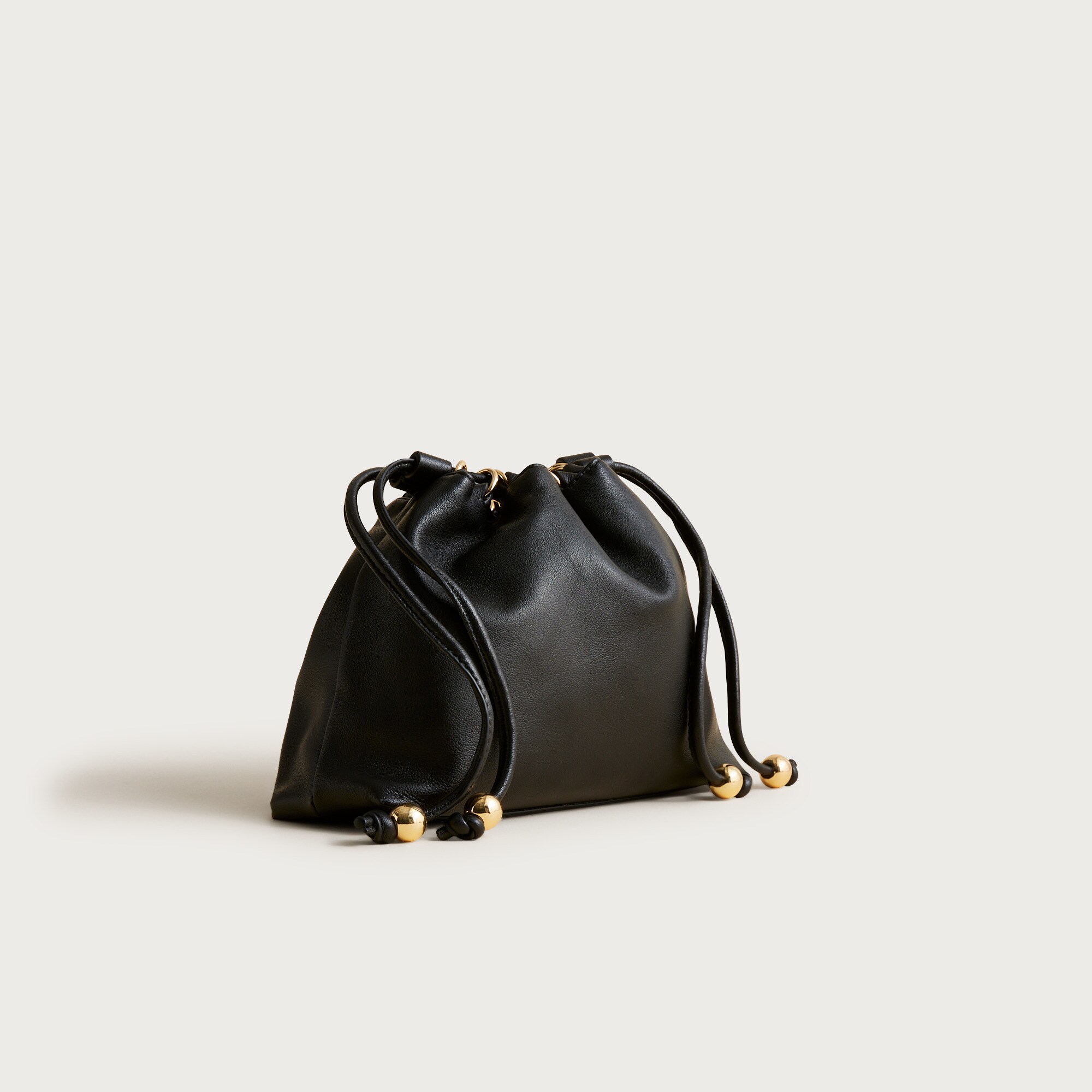 Drawstring pouch bag in leather