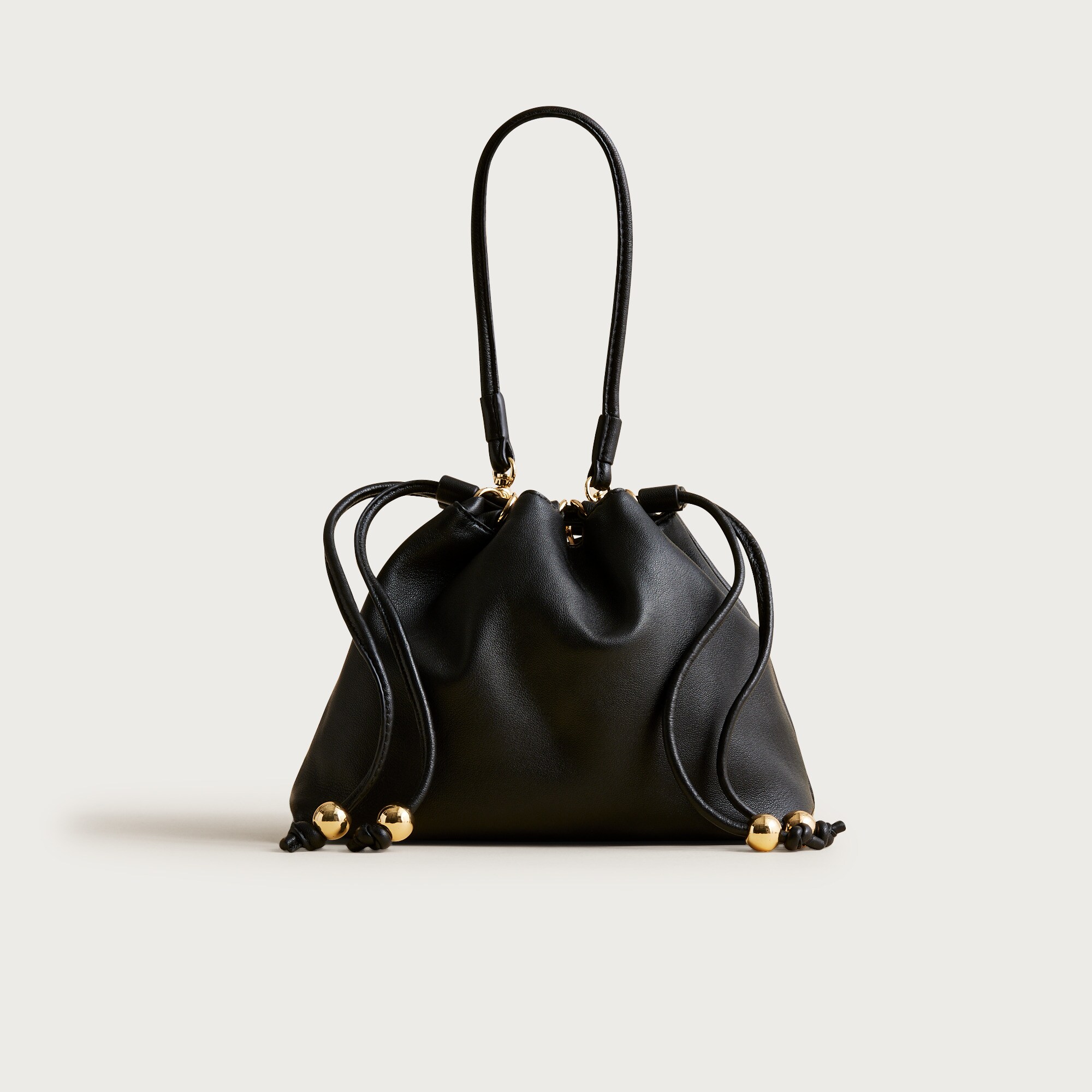 Drawstring pouch bag in leather