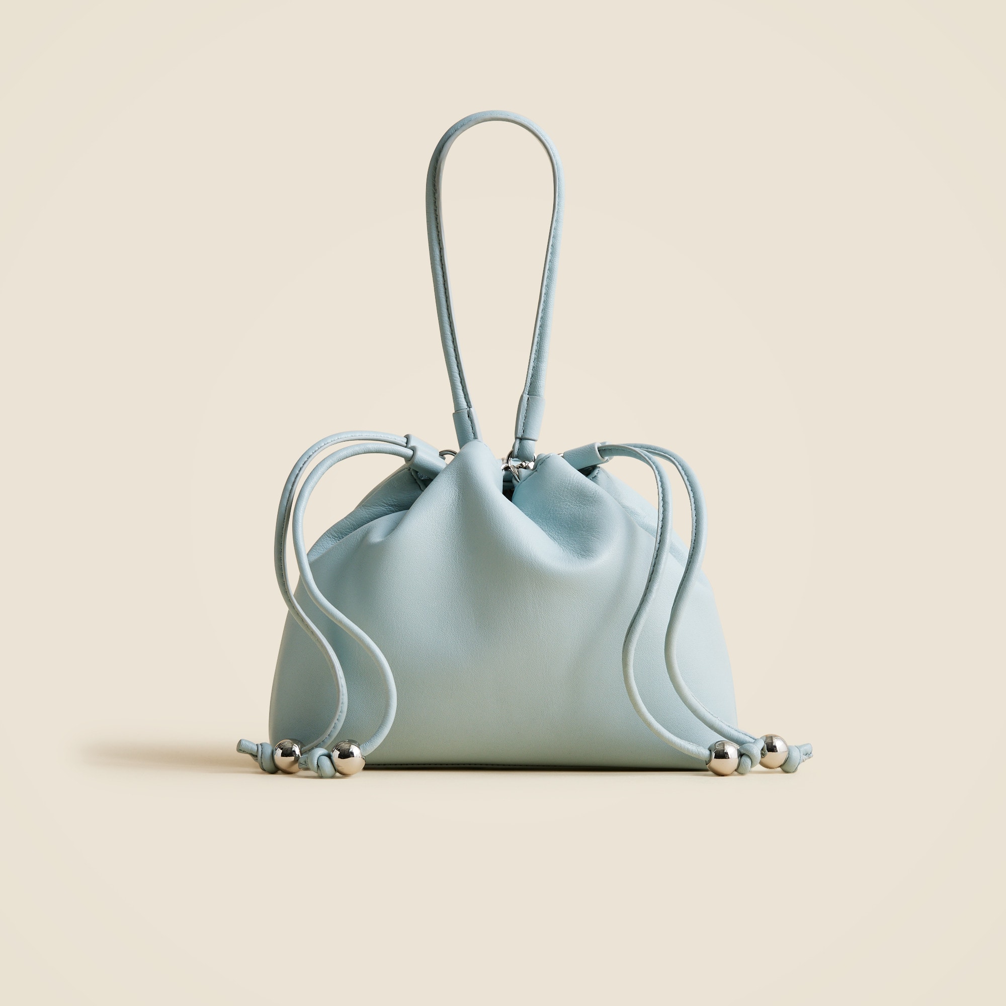 Drawstring pouch bag in leather