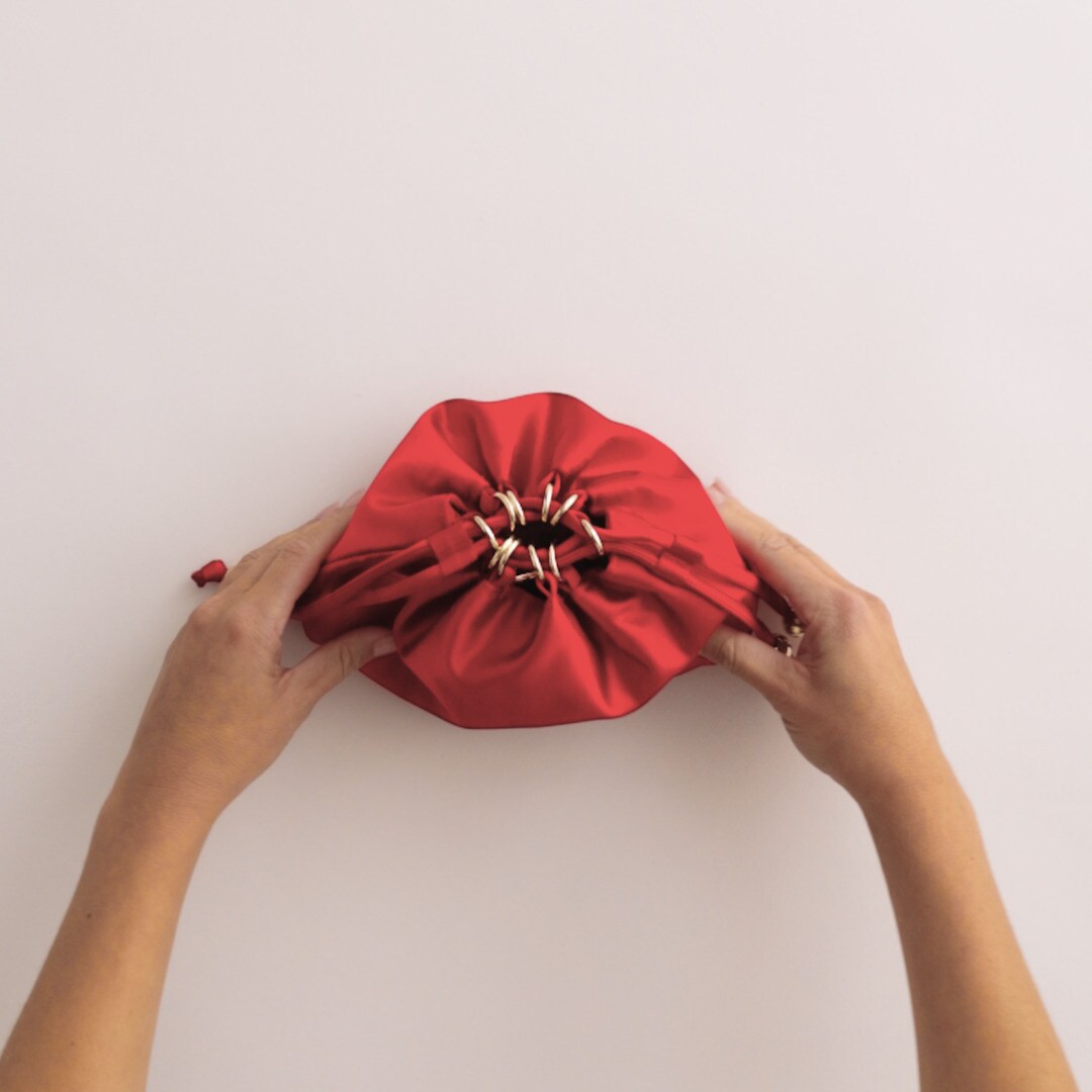 Drawstring pouch bag in satin