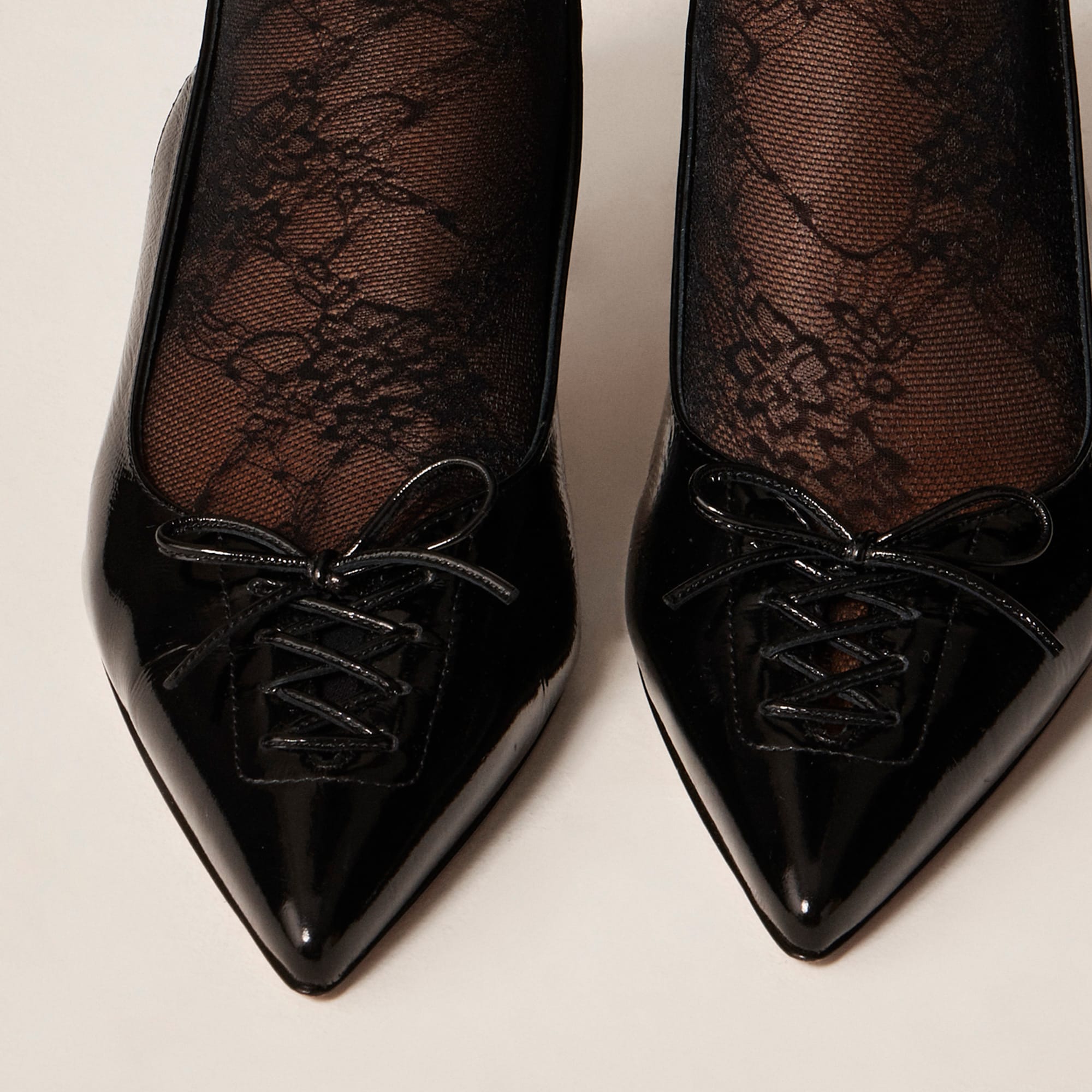 Made-in-Italy Colette lace-up slingback pumps in leather