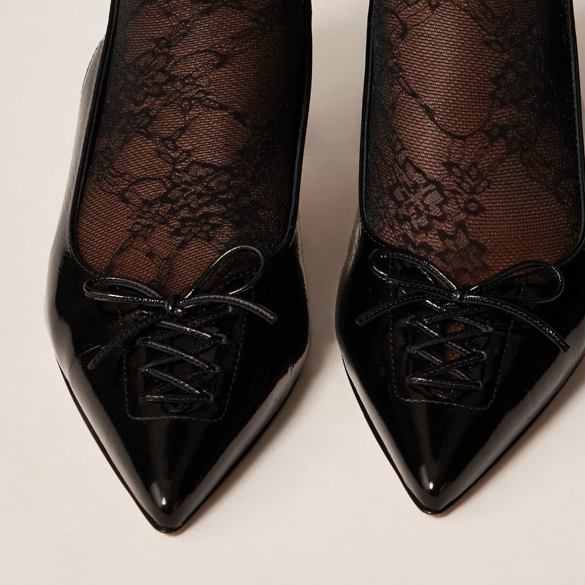 Made-in-Italy Colette lace-up slingback pumps in leather