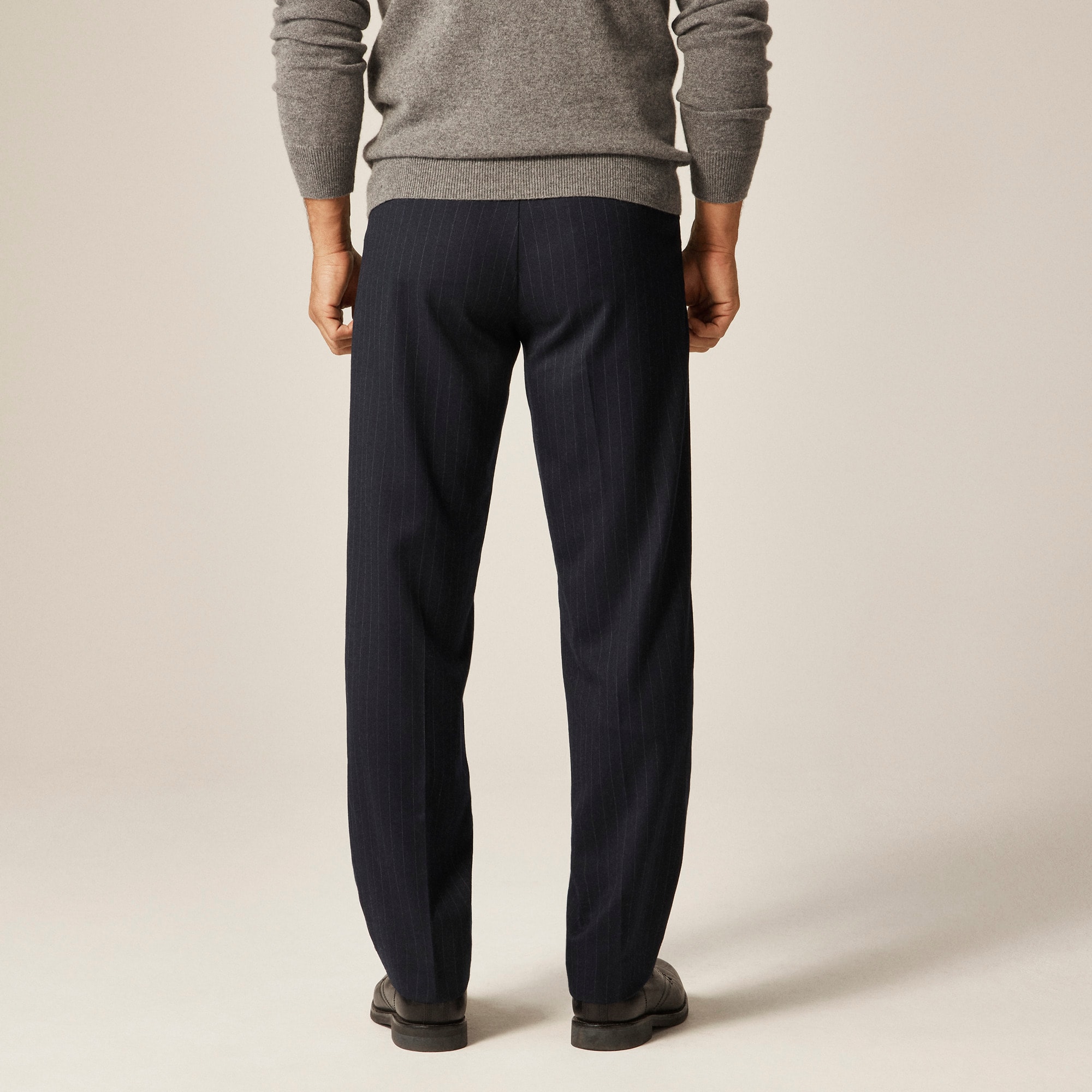 Classic pleated creased wool trouser in pinstripe