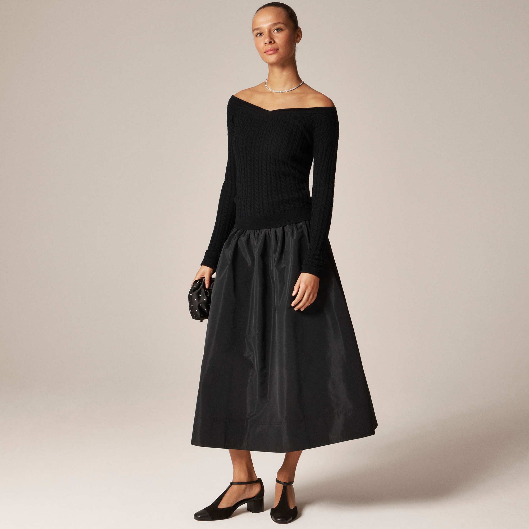 Cable-knit wide V-neck sweater in merino wool