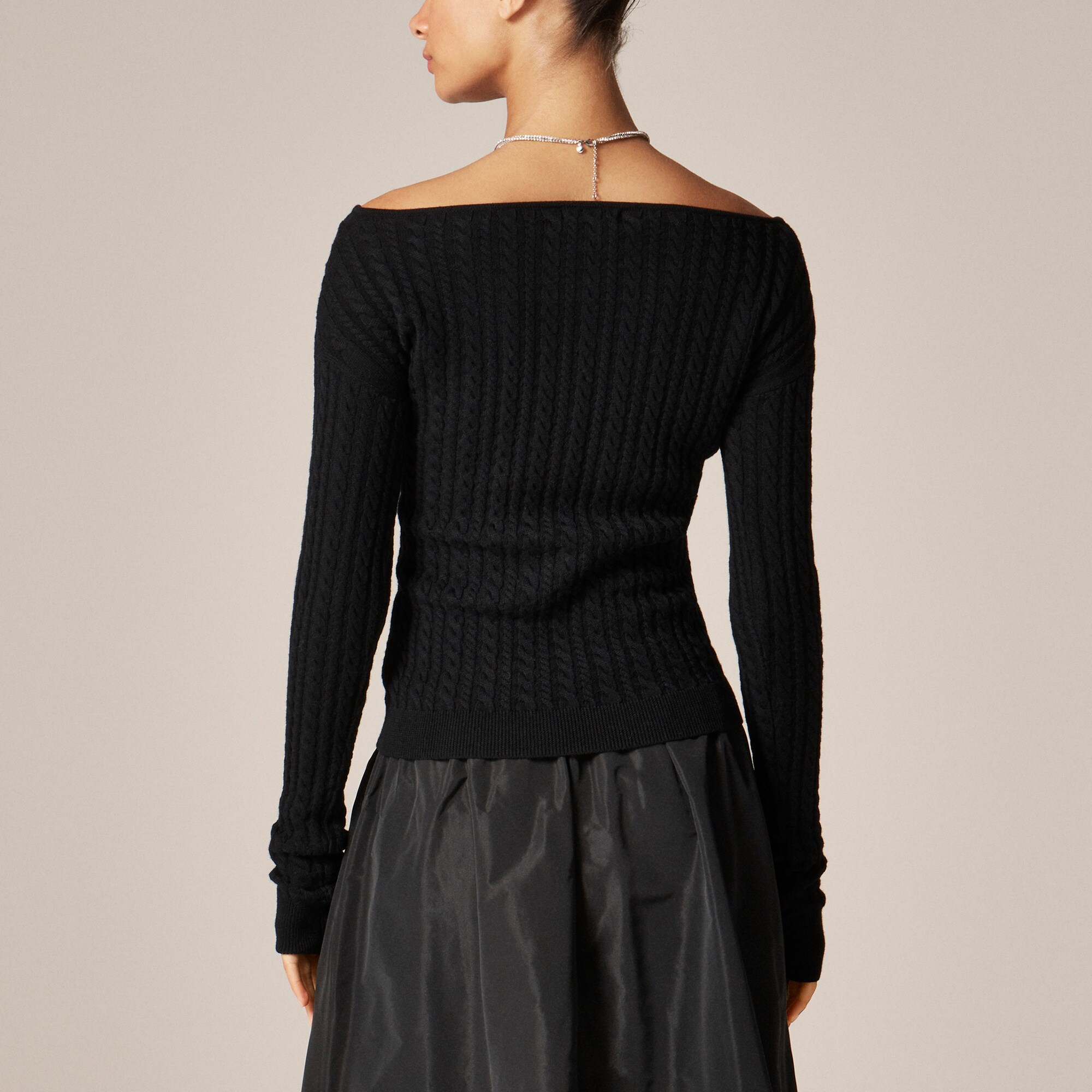 Cable-knit wide V-neck sweater in merino wool