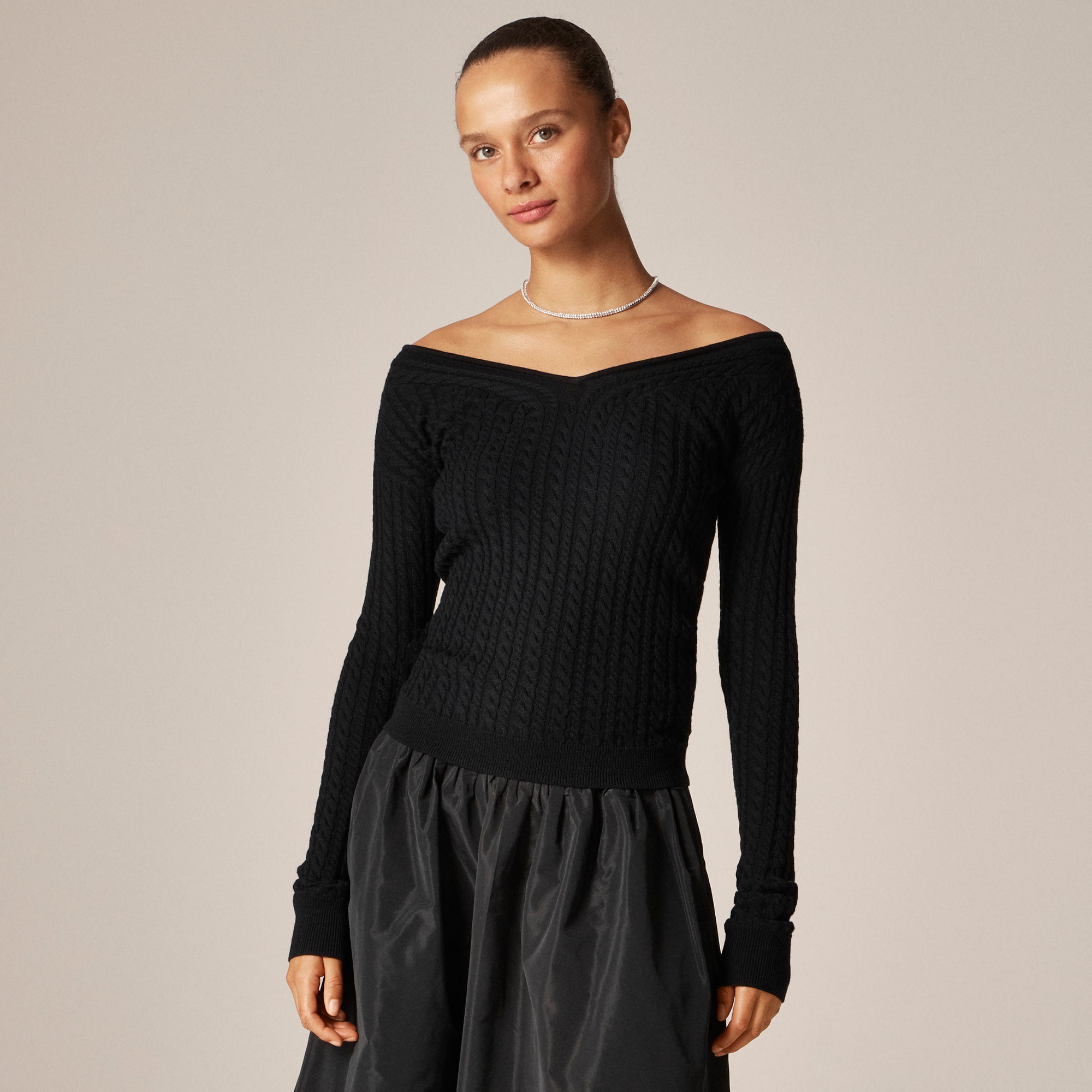 Cable-knit wide V-neck sweater in merino wool