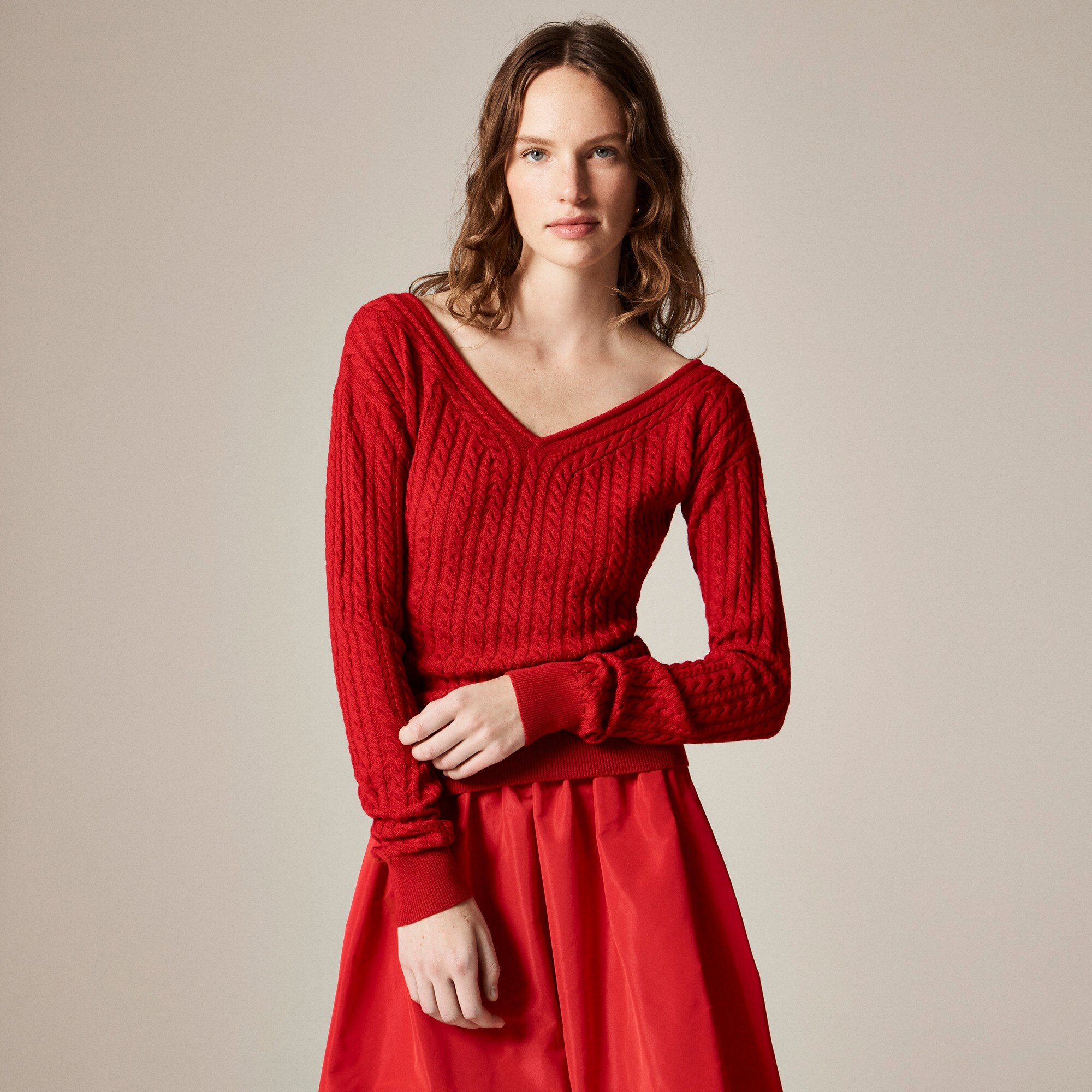 Cable-knit wide V-neck sweater in merino wool
