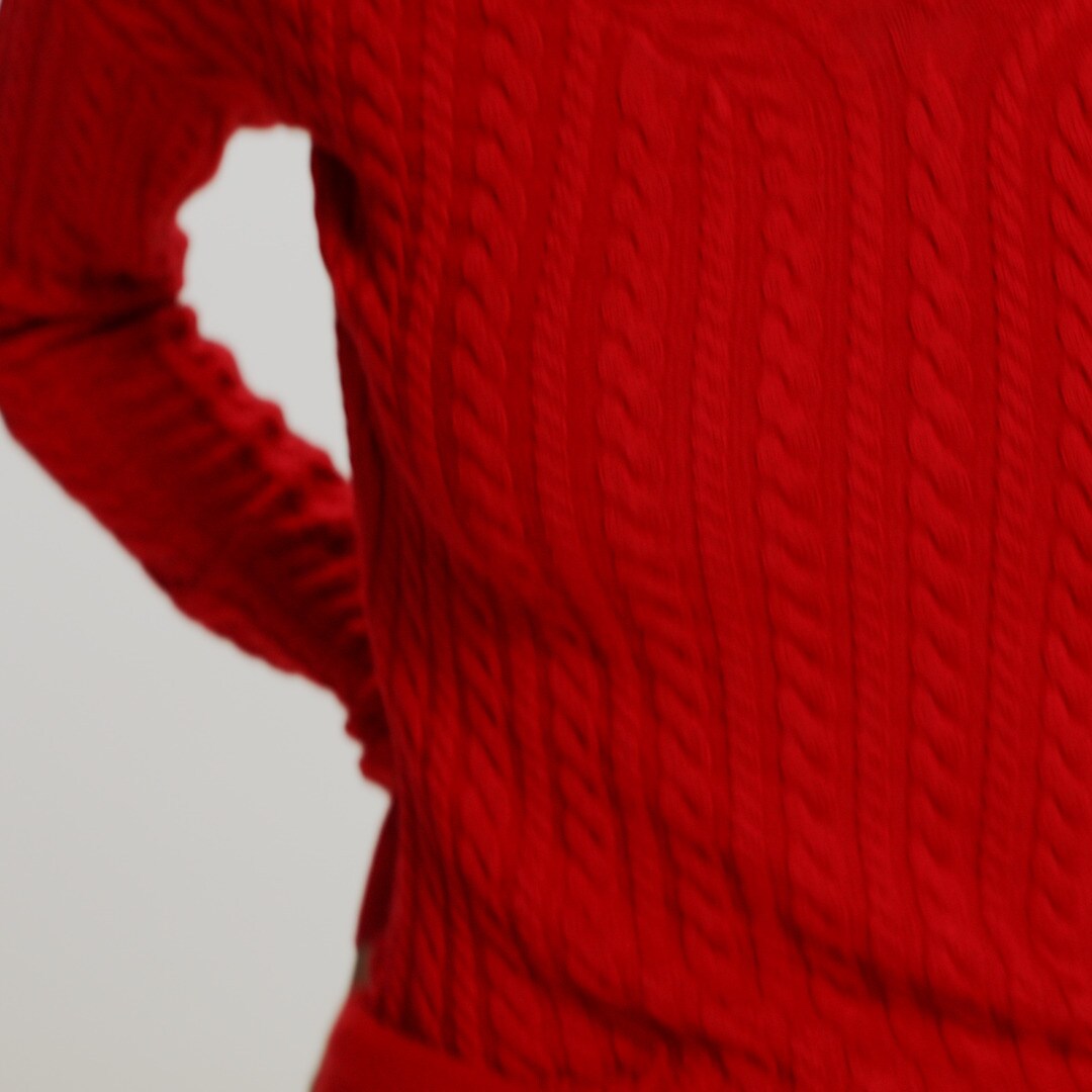 Cable-knit wide V-neck sweater in merino wool