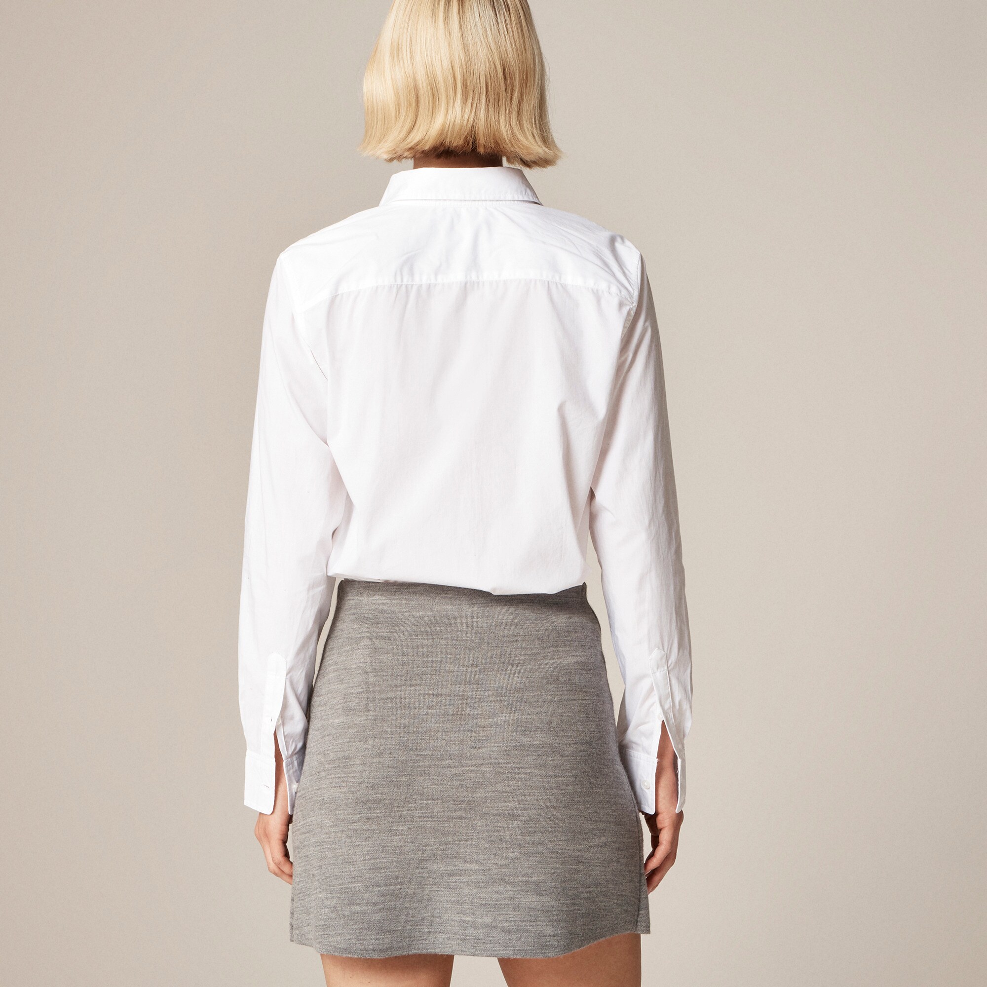Faux-wrap mini skirt in merino wool blend