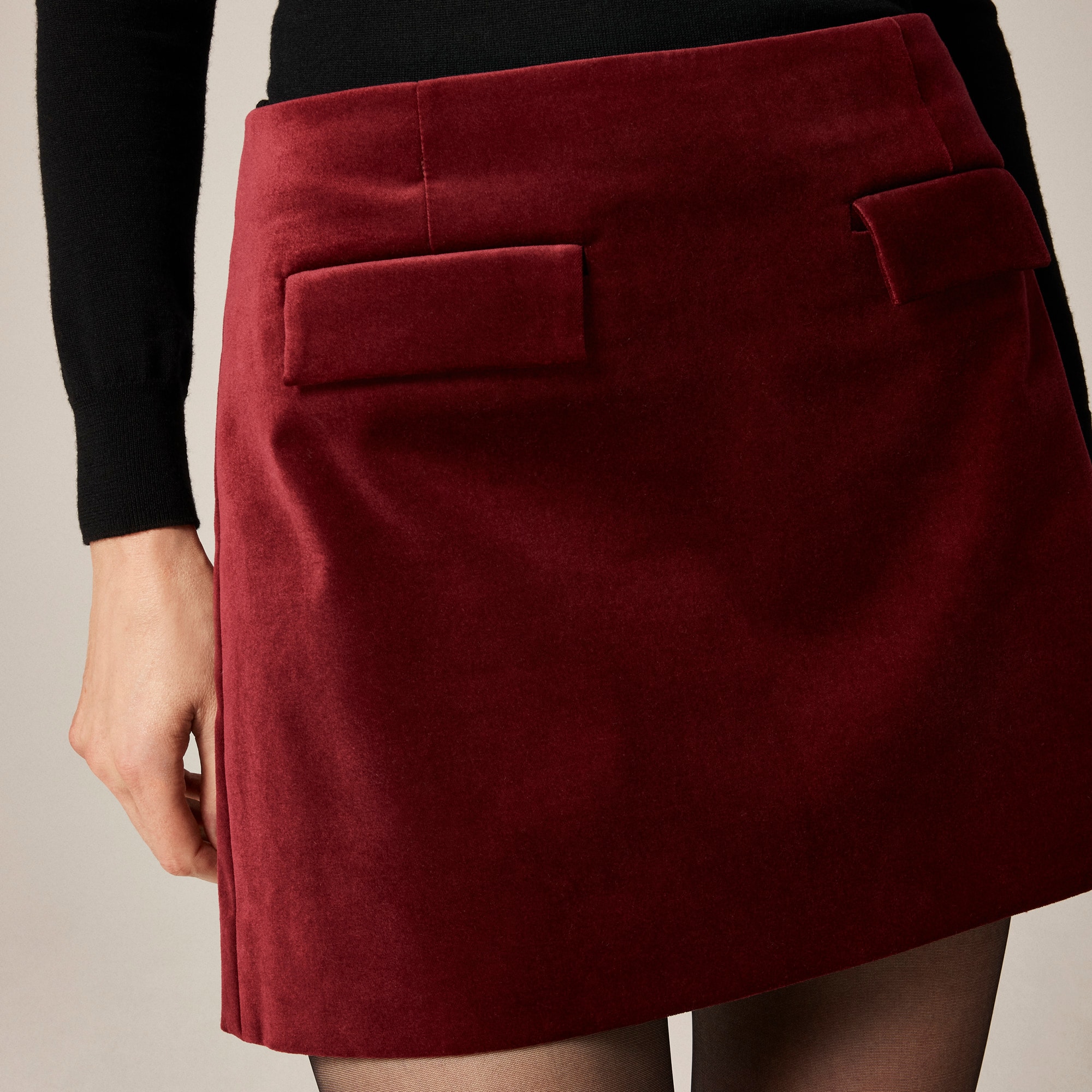 Flap-pocket mini skirt in velvet