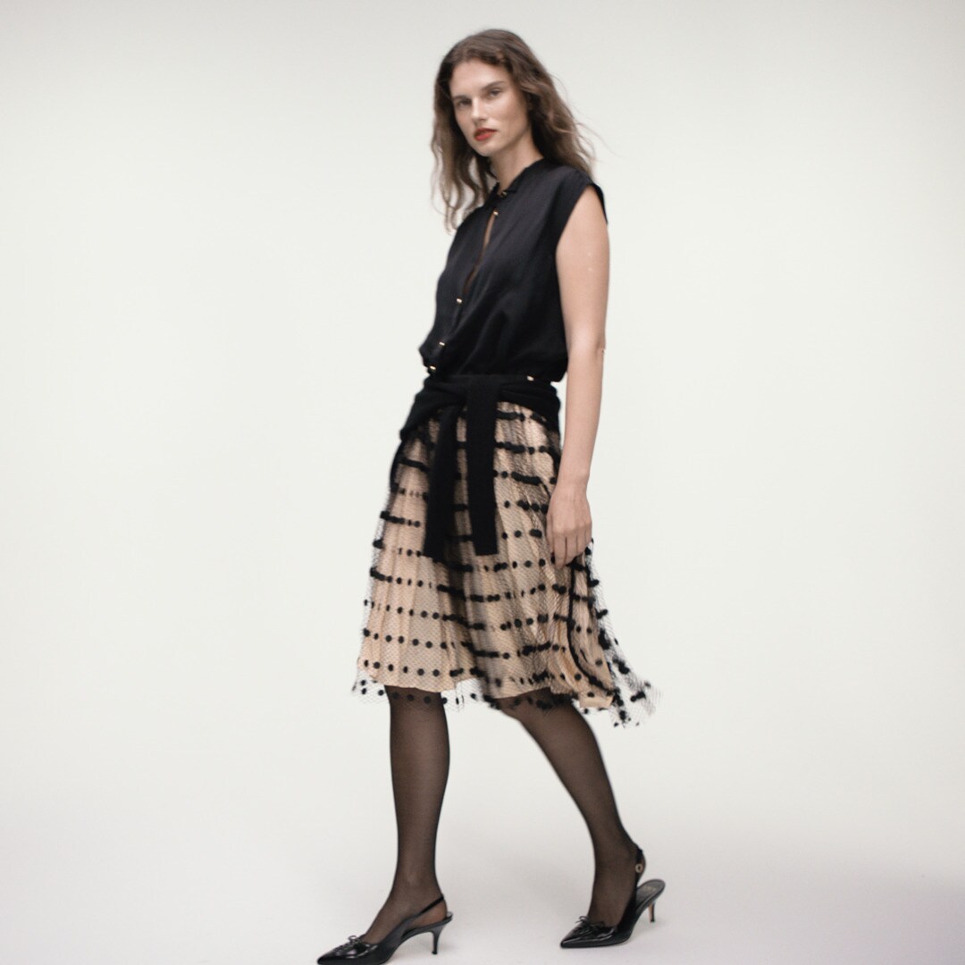 Collection layered mesh skirt with dots