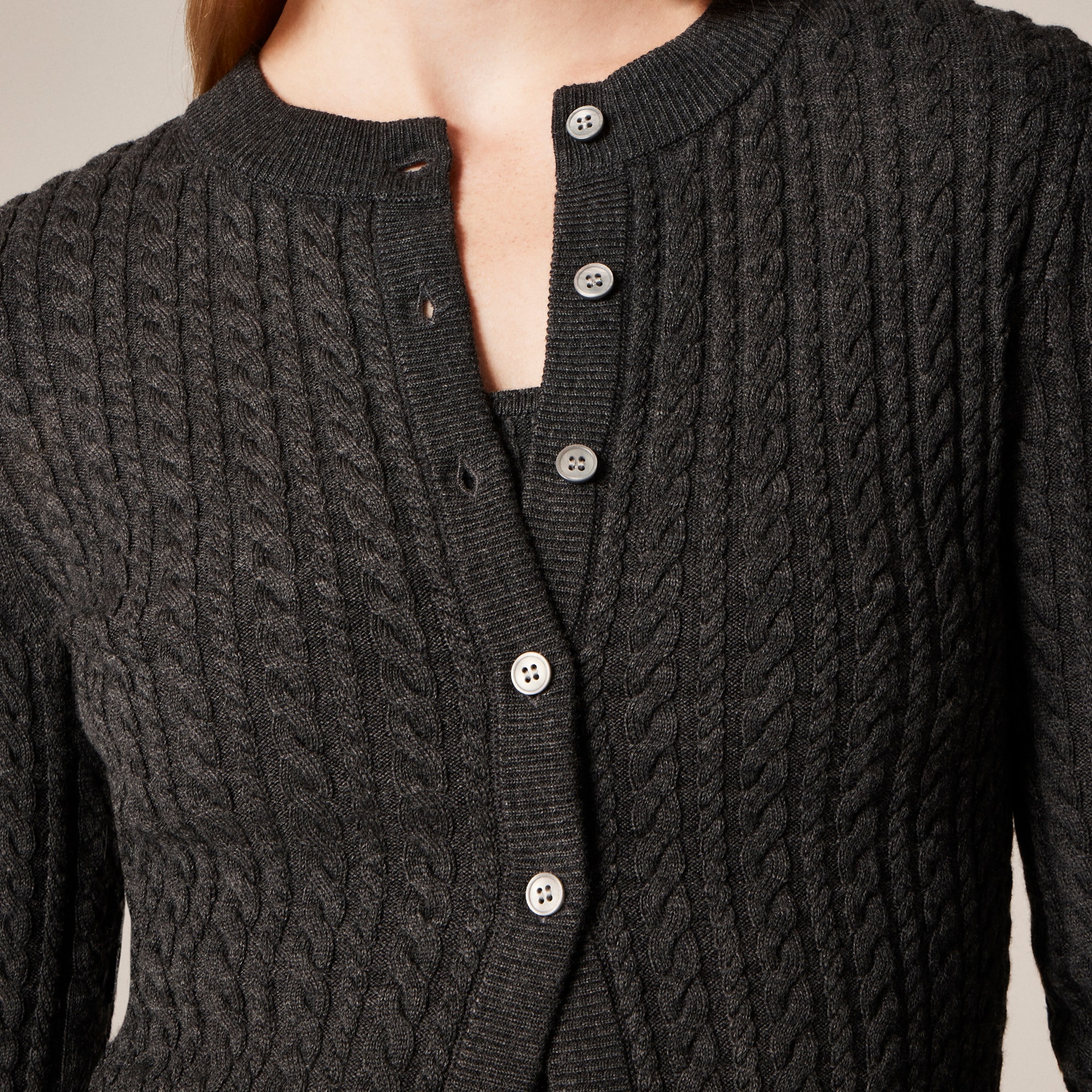 Cable-knit crewneck cardigan in merino wool