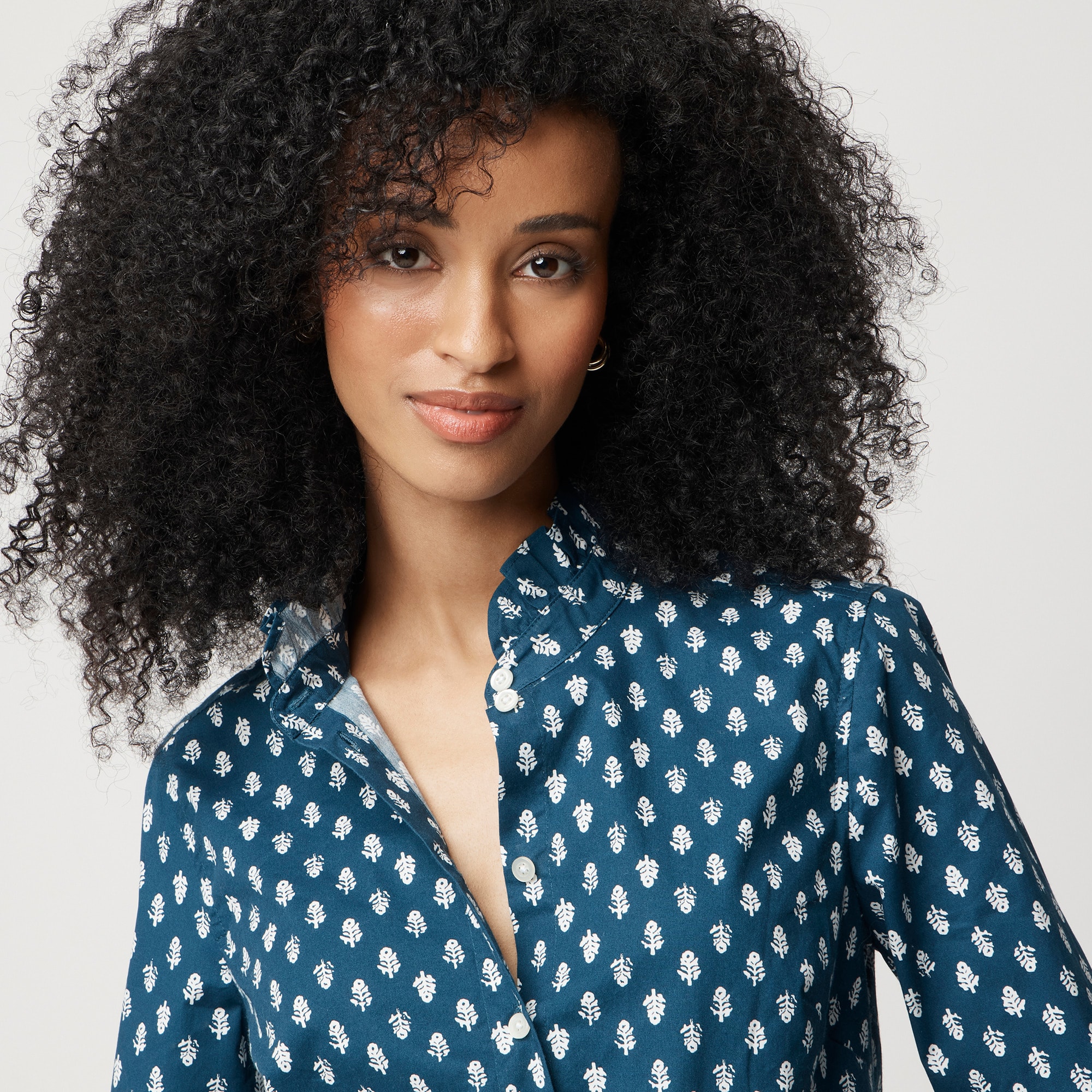 Printed ruffle button-up shirt