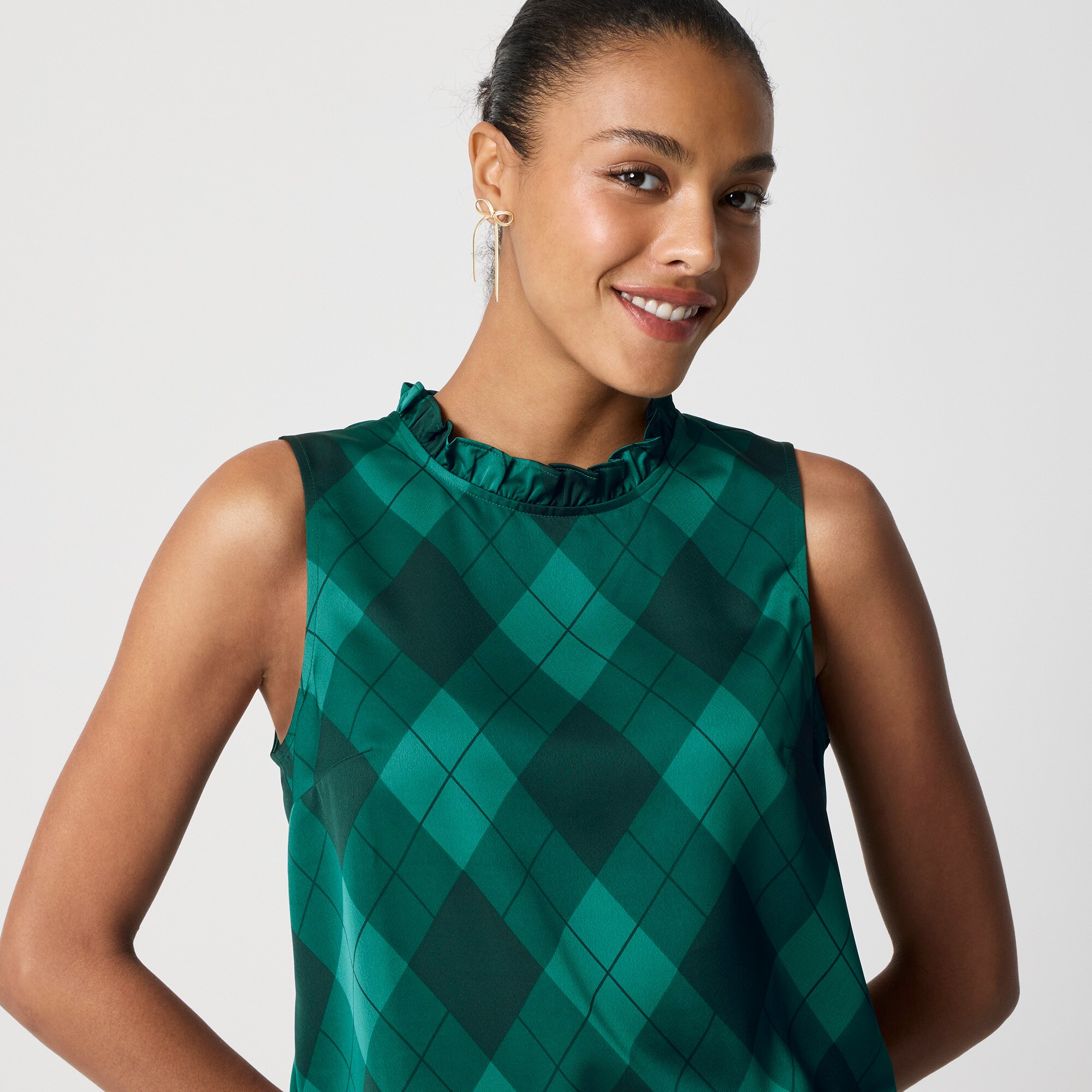 Sleeveless ruffleneck top