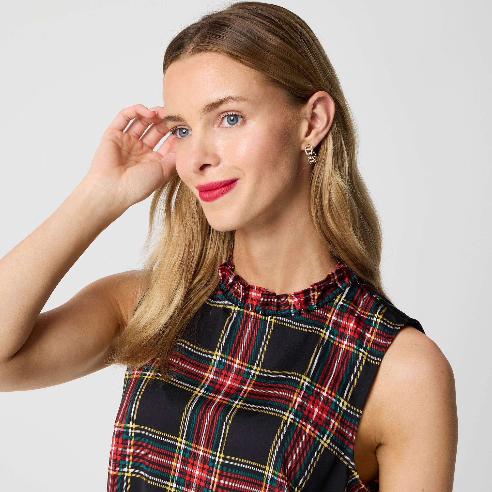 Sleeveless ruffleneck top