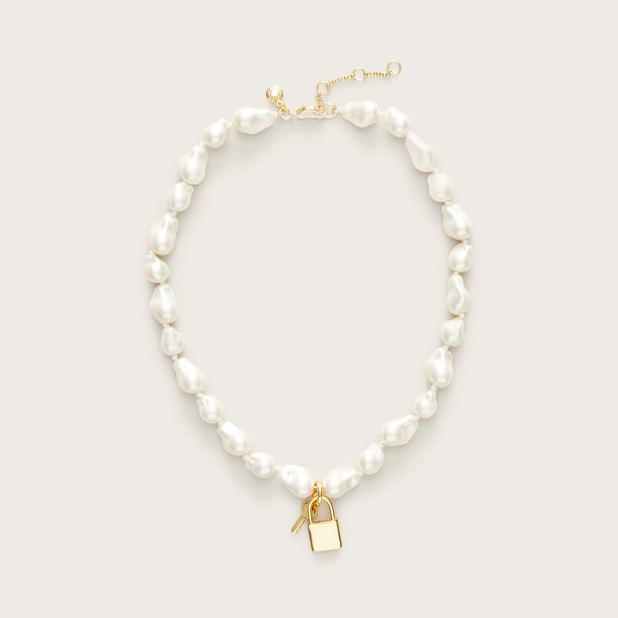  Baroque pearl necklace with key pendant