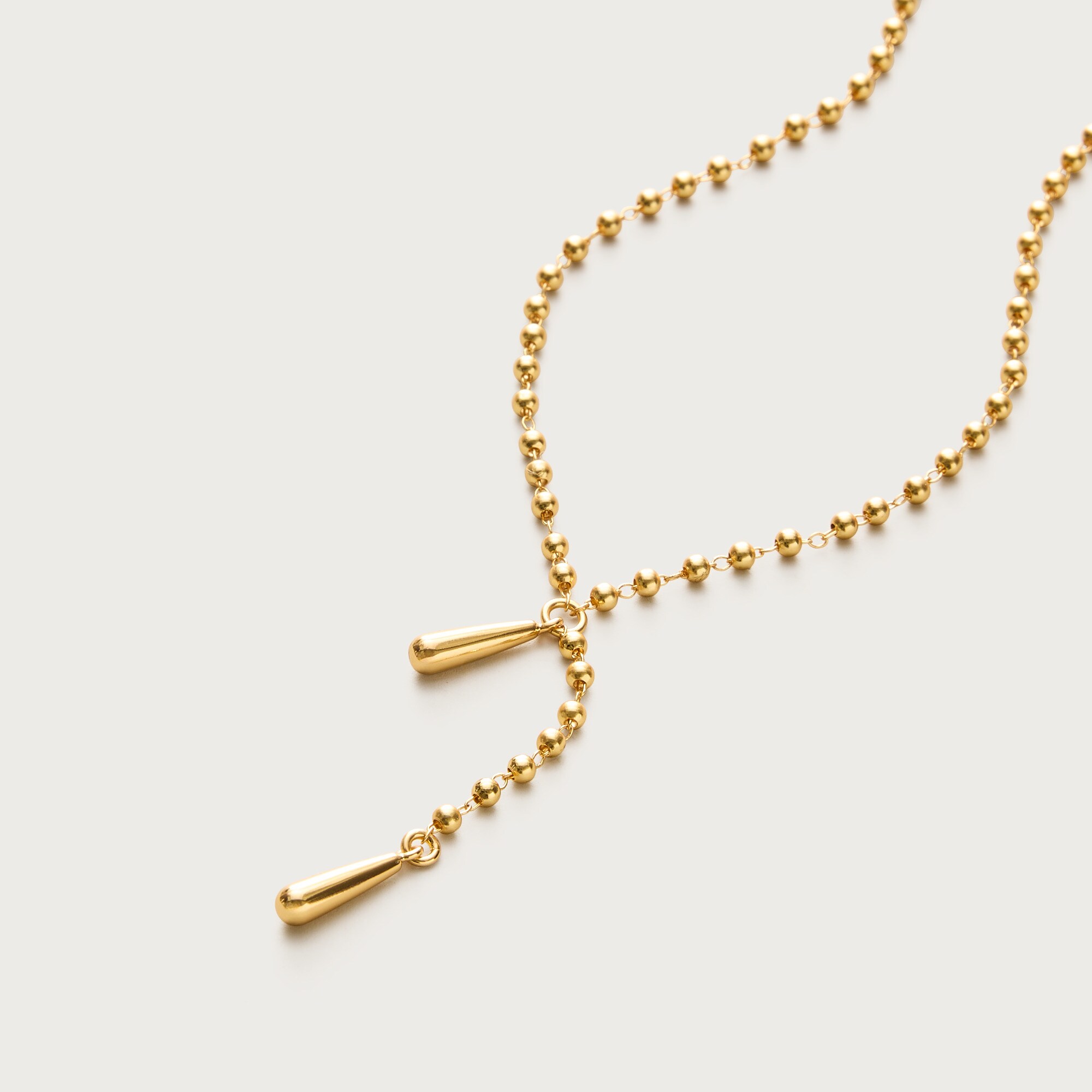 Metal beaded lariat necklace
