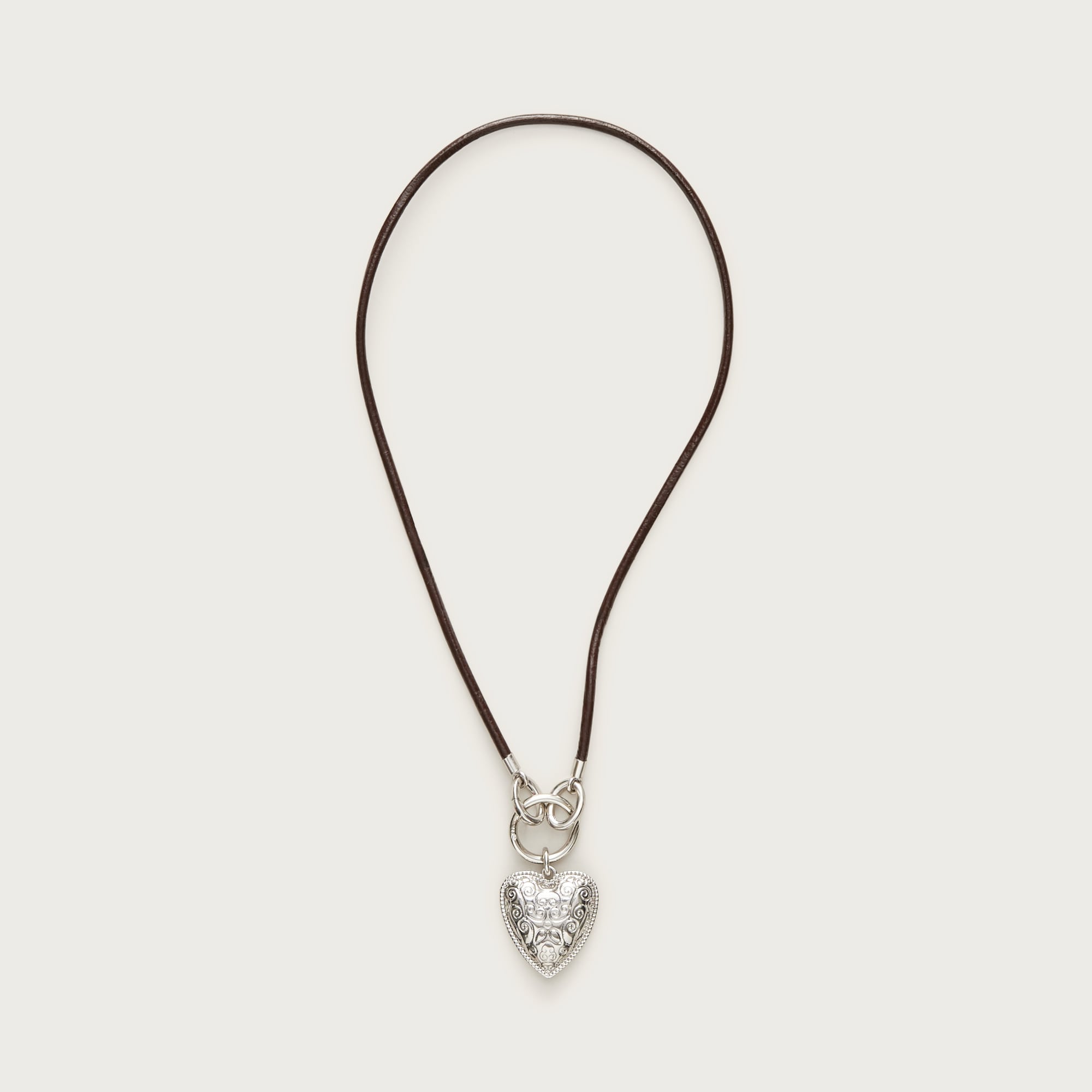 Engraved heart necklace with leather cord