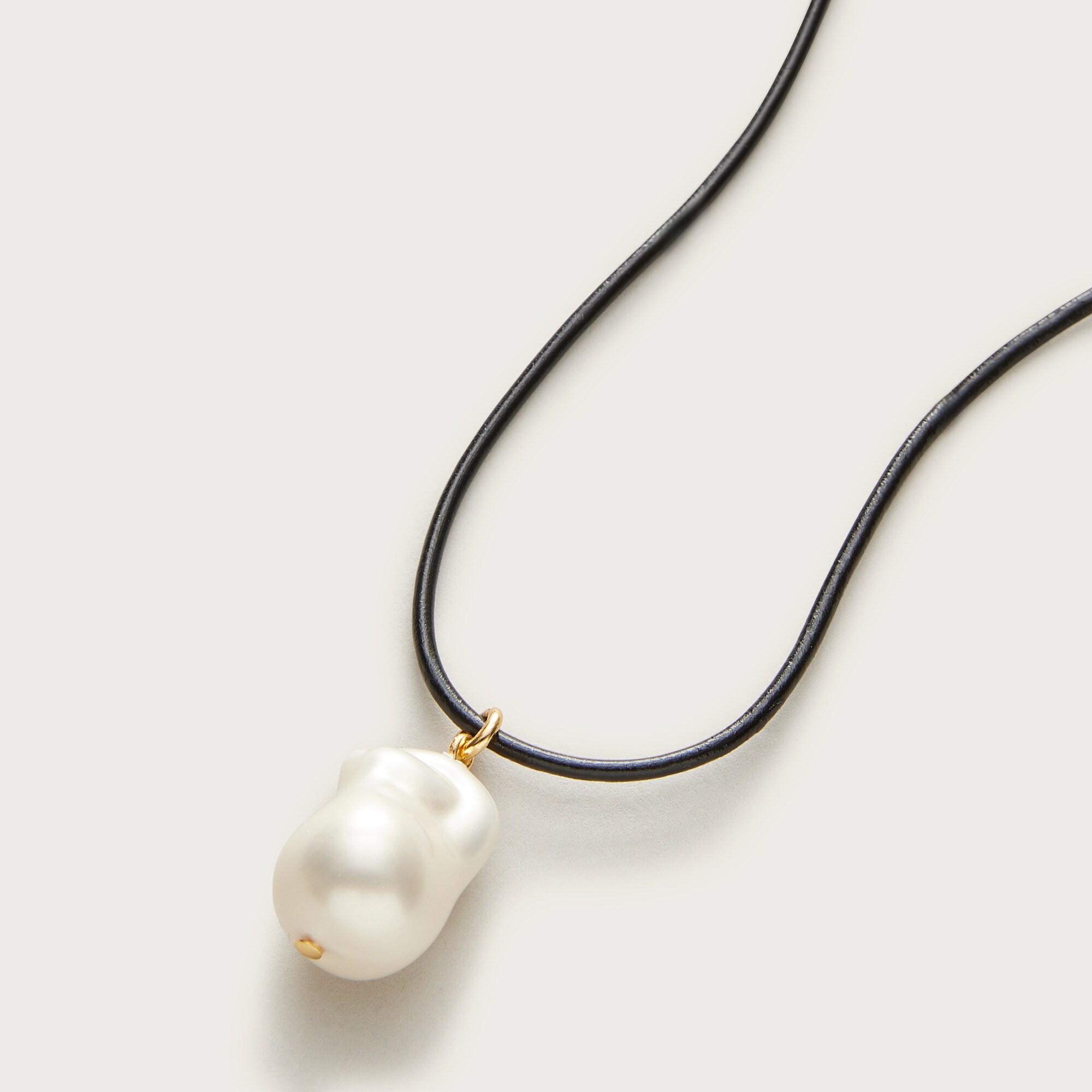 Pearl pendant and leather cord necklace