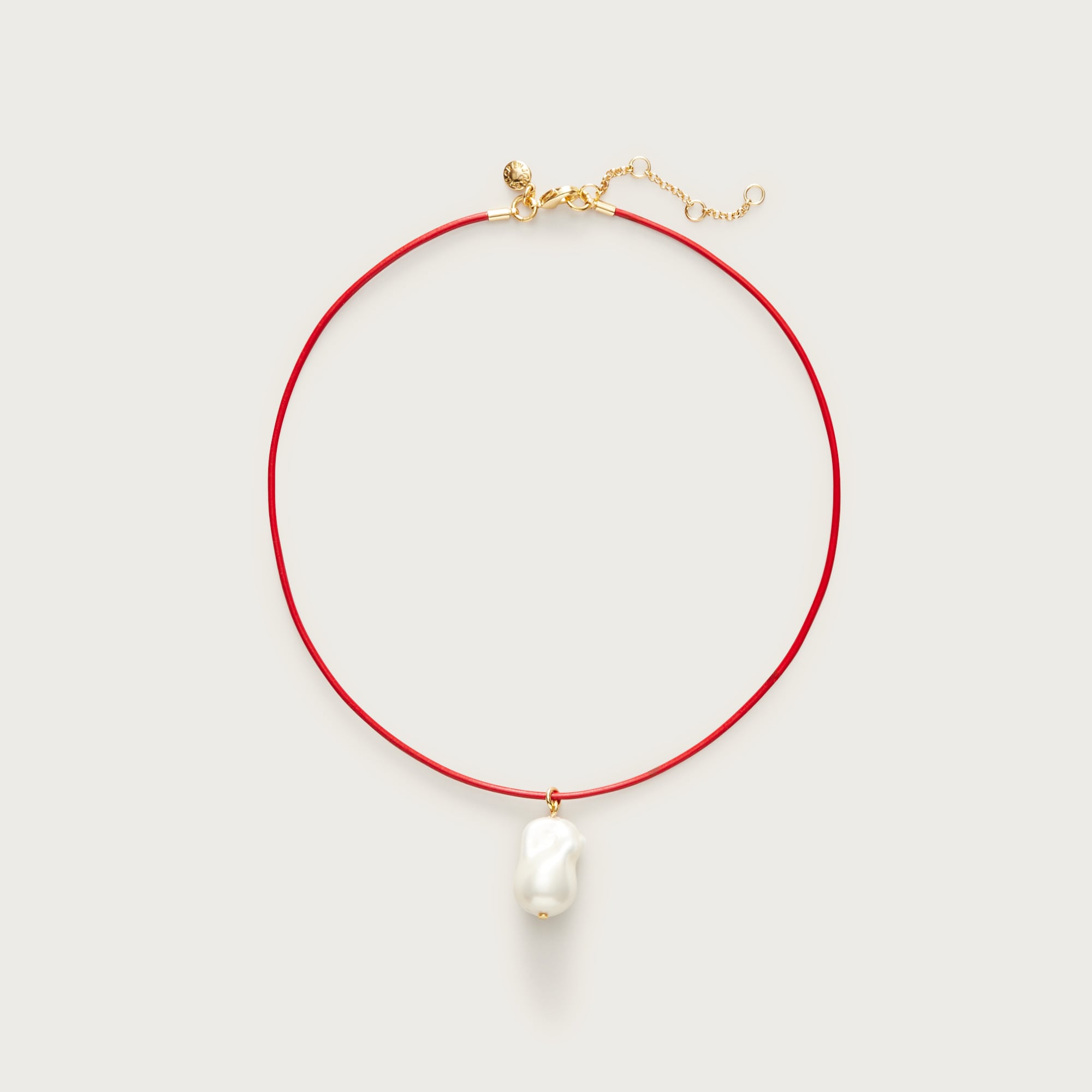 Pearl pendant and leather cord necklace