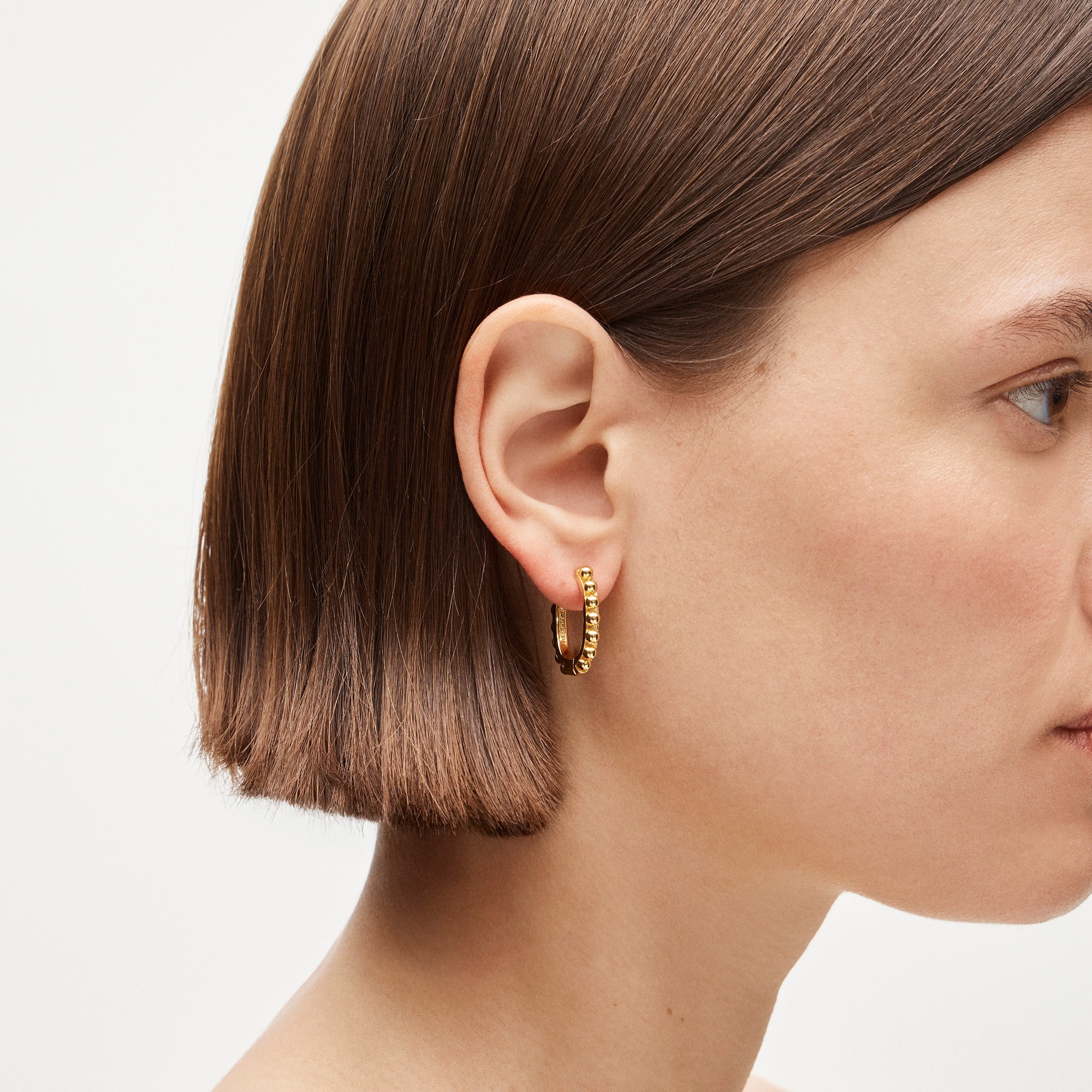 Metallic beaded hoop earrings