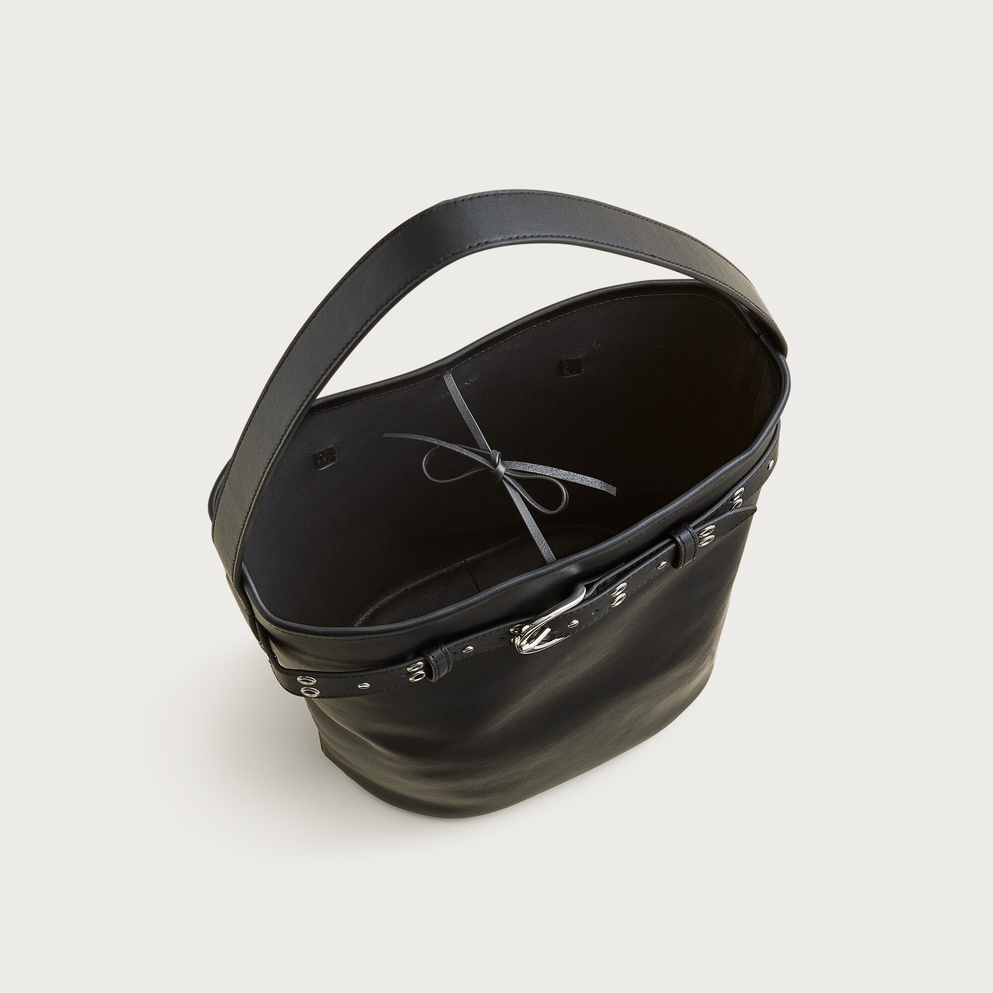 Berkeley belted bucket bag in studded leather