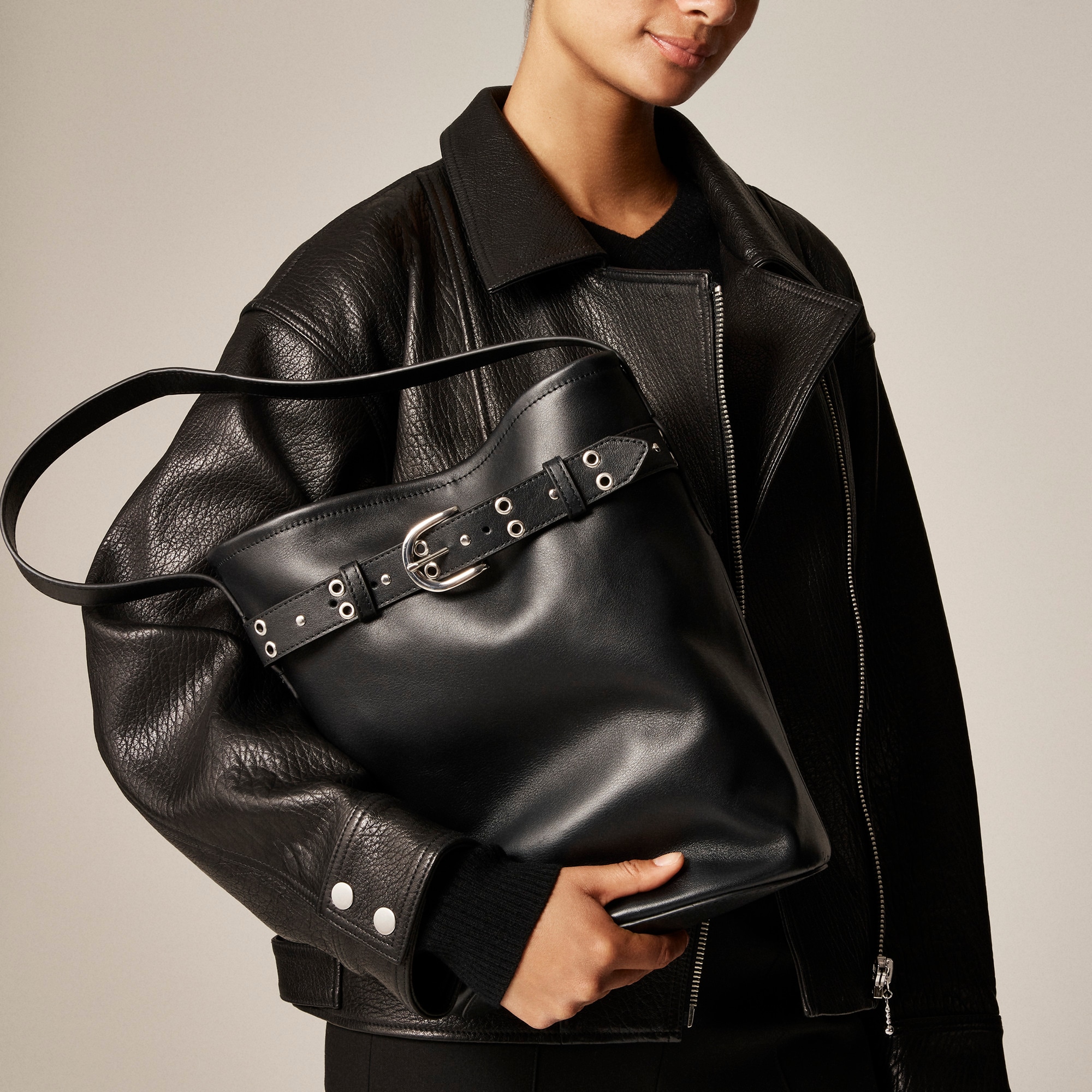 Berkeley belted bucket bag in studded leather