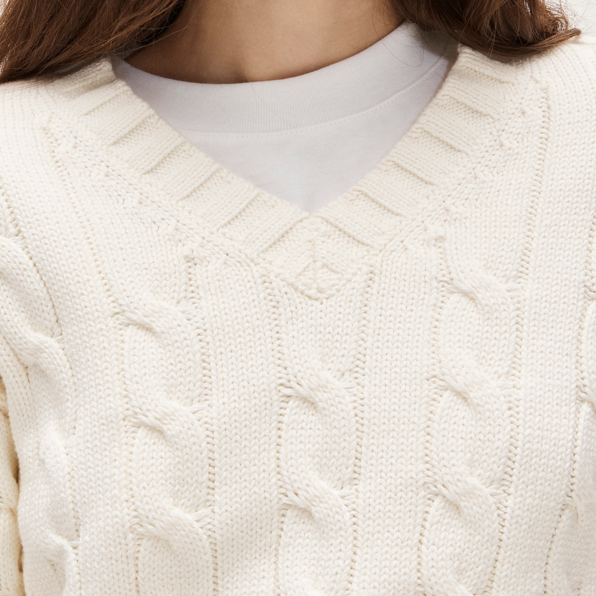 Cable-knit high V-neck sweater in heritage cotton