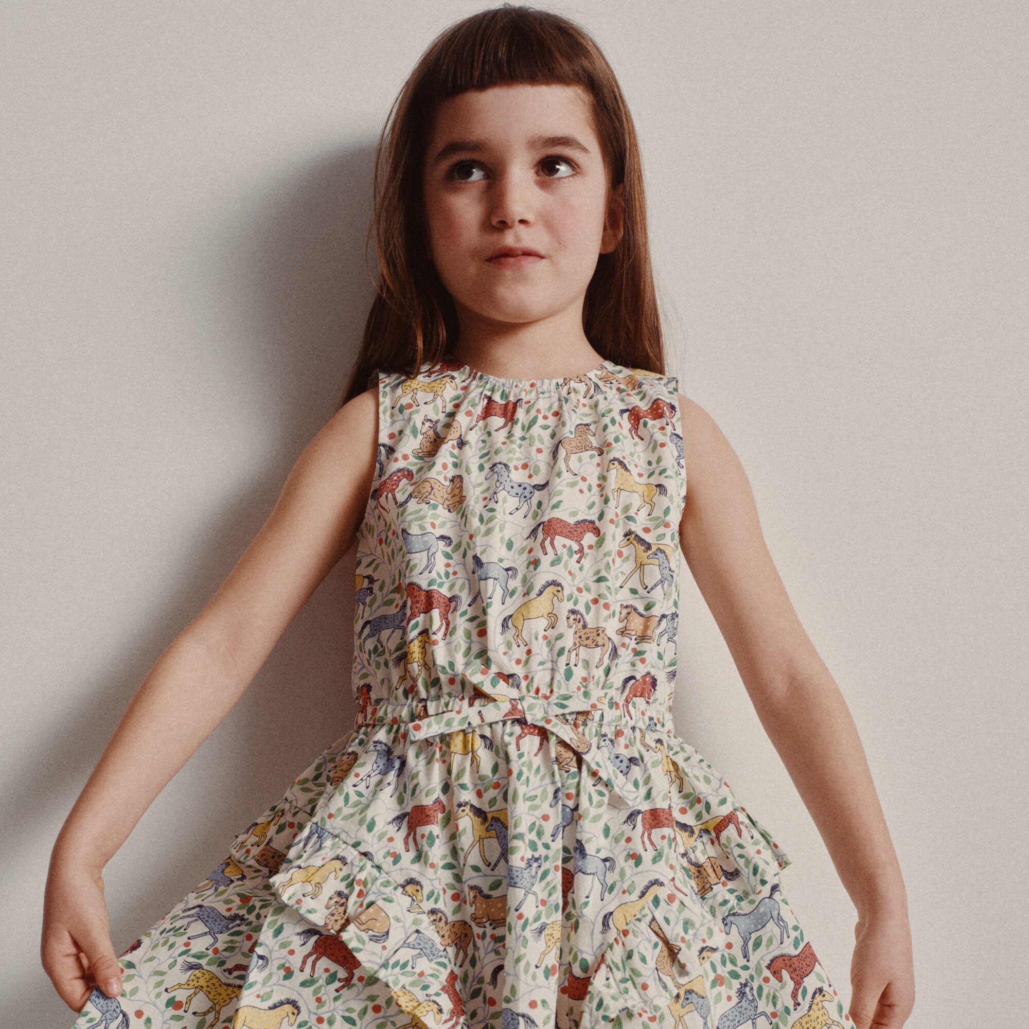  Girls' ruffle-skirt dress in wild horses print