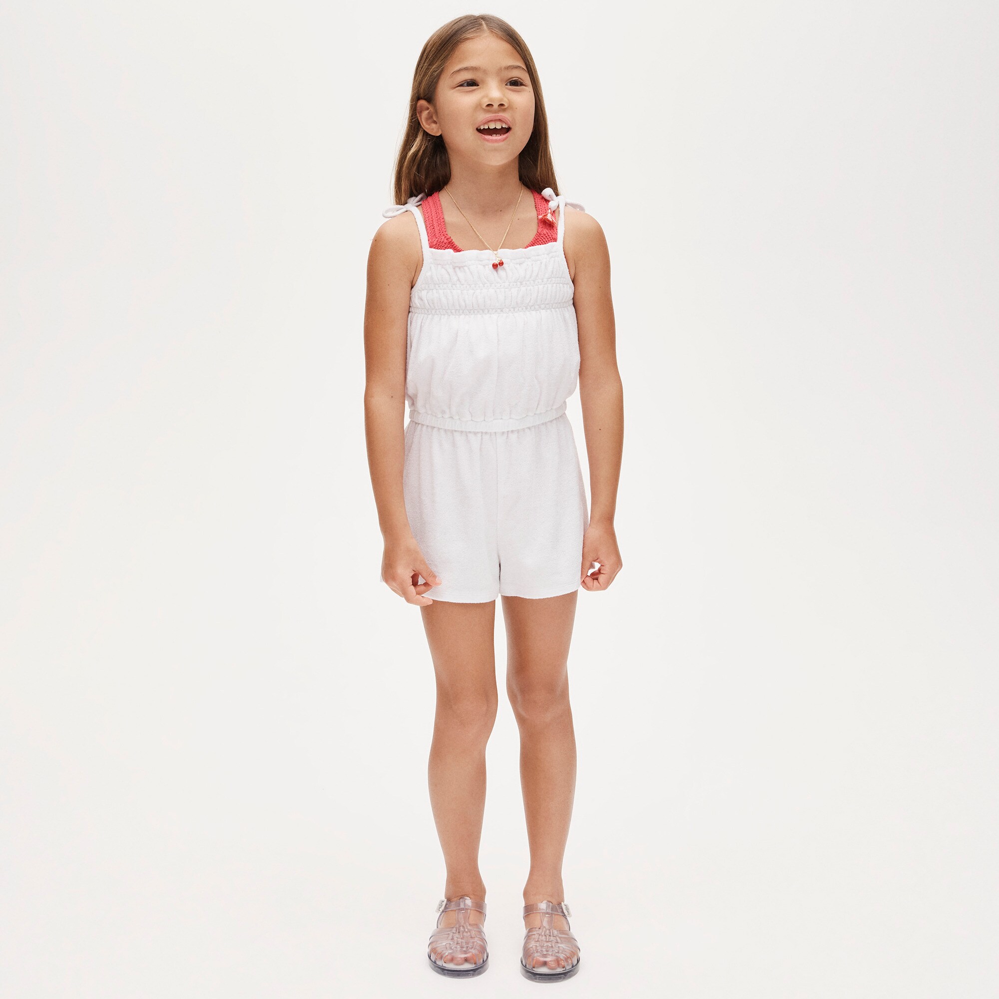  Girls' smocked romper in towel terry