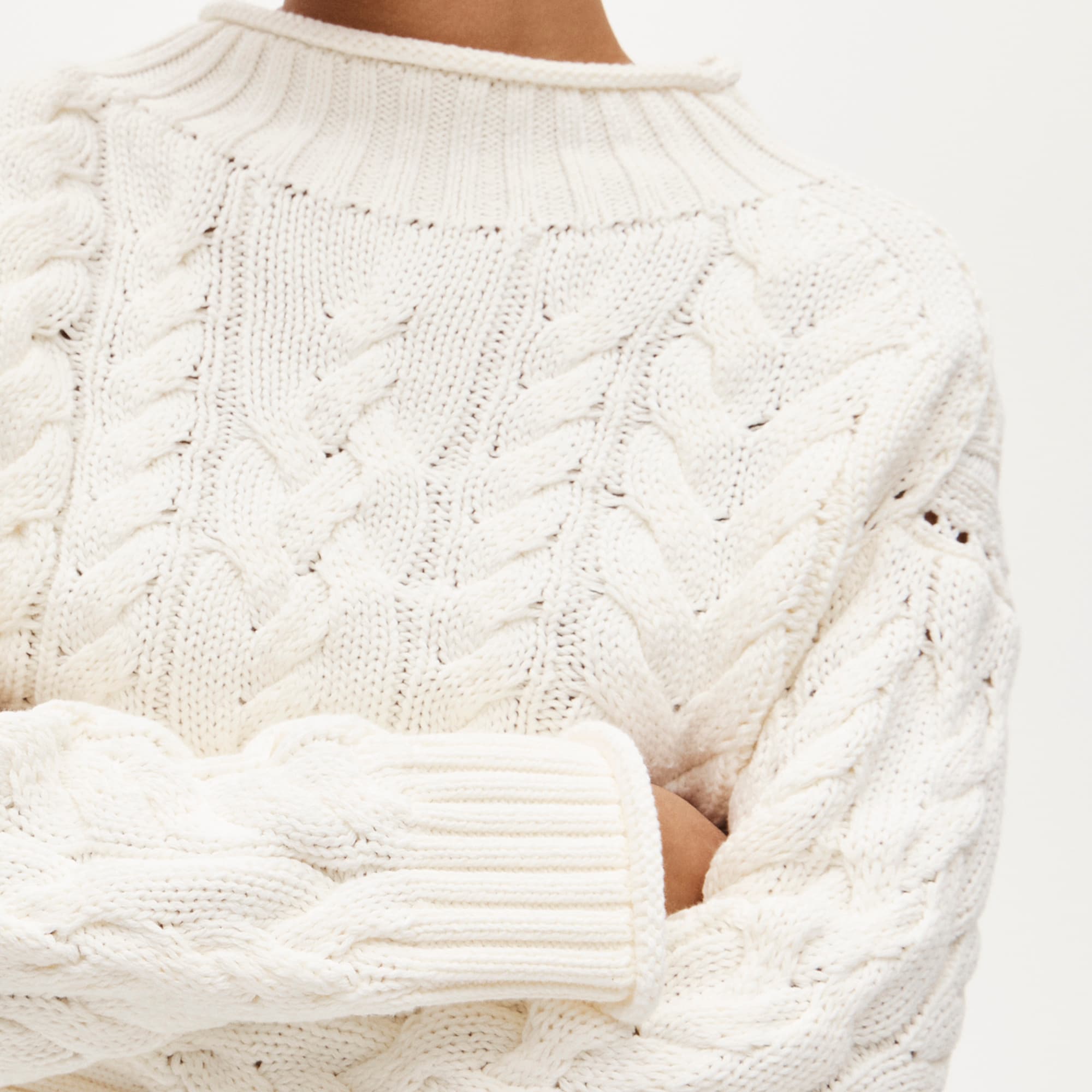 2025 Rollneck™ cable-knit sweater