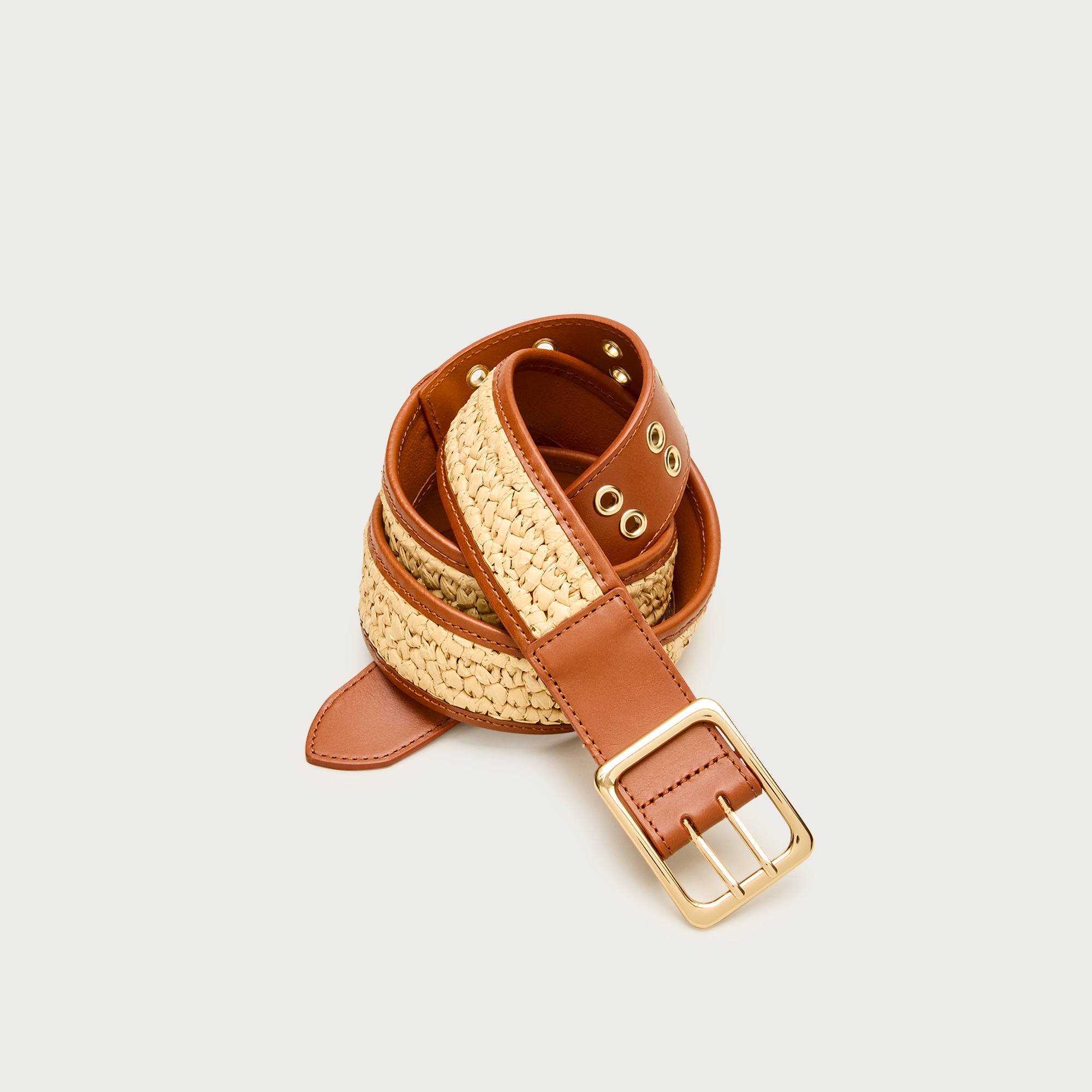 Grommet belt in leather and faux raffia